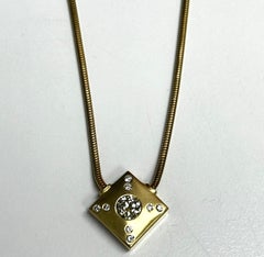 Modern Geometric Diamond Pendant in Yellow Gold
