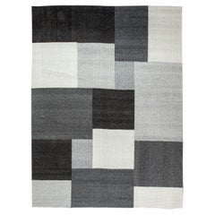 Tappeto moderno geometrico grigio, bianco e nero di Doris White Blau