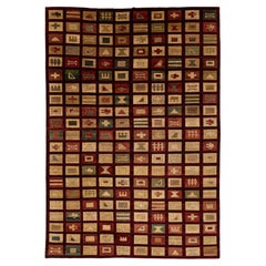 Tapis en laine noué à la main, au motif géométrique moderne, dans des tons bordeaux foncé et terre