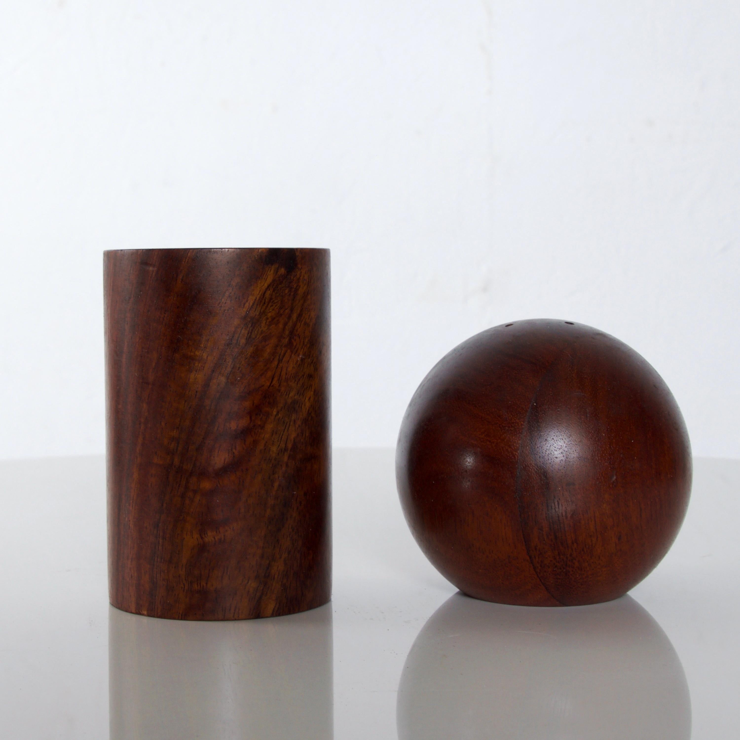 Scandinavian Mid-Century Modern fabulous geometric set salt and pepper shaker in rich rosewood from Denmark, 1960s
Modern shaped design a circle ball and a cylinder as shakers.
Measures: 6.25 height x 3 inches diameter, ball 3 x 3, cylinder 3.5