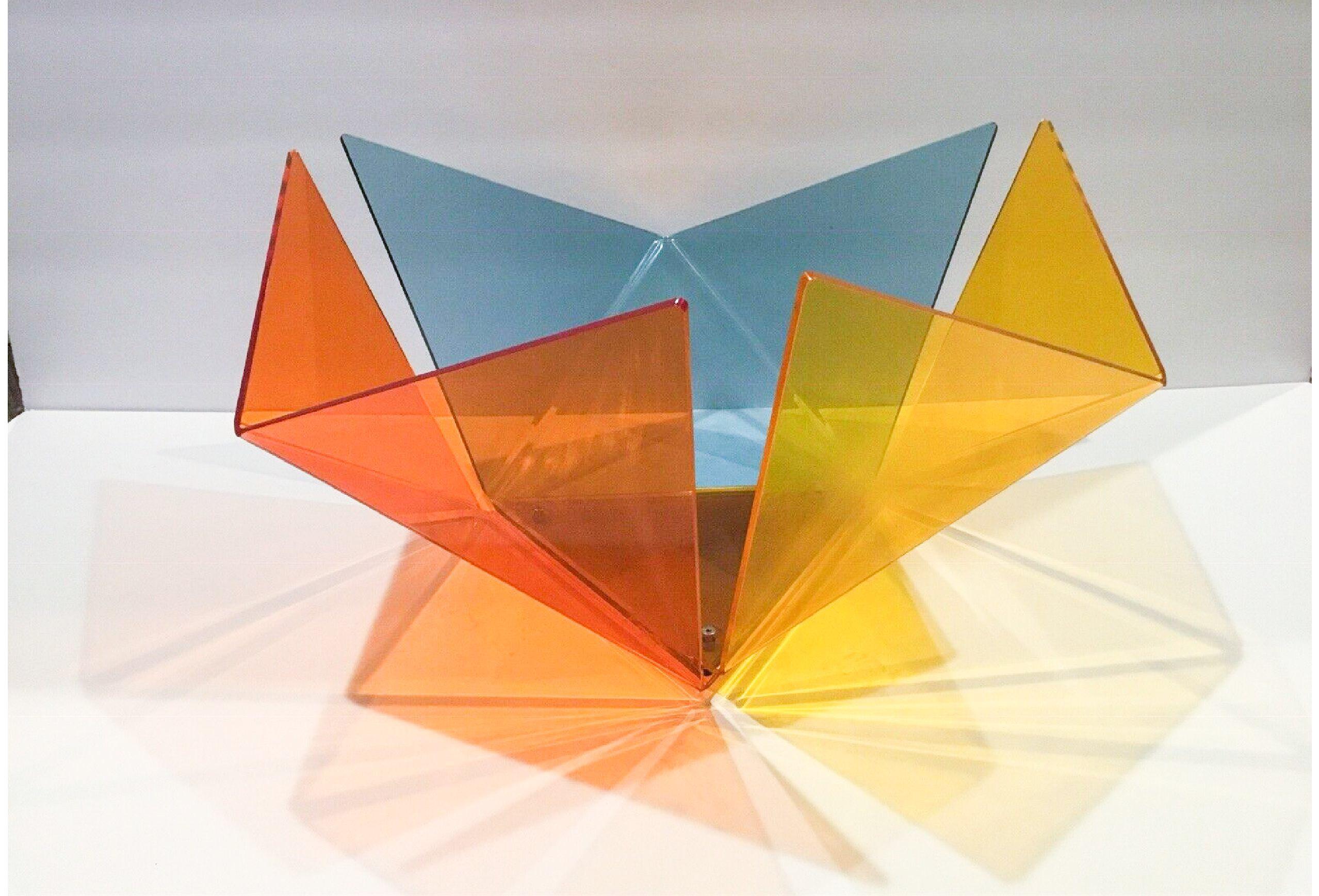 Modern Geometric color theory Lucite fruit bowl by Procter-Rihl for MoMA NY, 1997.

Space-Lily (or SPACELILY) fruit bowl created by Procter- Rihl, a famed architecture and design company from the UK, in limited quantity of 300 in 1996-1997 to be