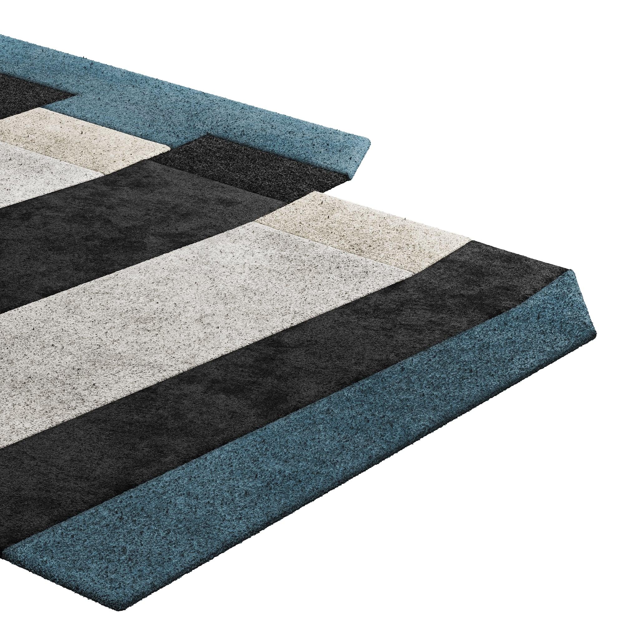 Tapis Retro #015 is a retro rug with an irregular shape and timeless colors. Inspired by architectural lines, this geometric rug makes a statement in any living space. 

Using a 3D-tufted technique that combines cut and loop pile, the retro rug in