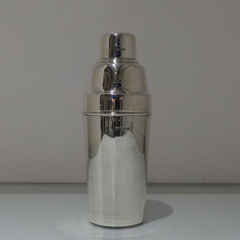 A rare and extremely desirable pre Art Deco period plain formed cocktail Shaker which in design quietly shifts from the Edwardian period to the early stages of the Art Deco movement. The Shaker detaches in three sections and all pieces inter lock