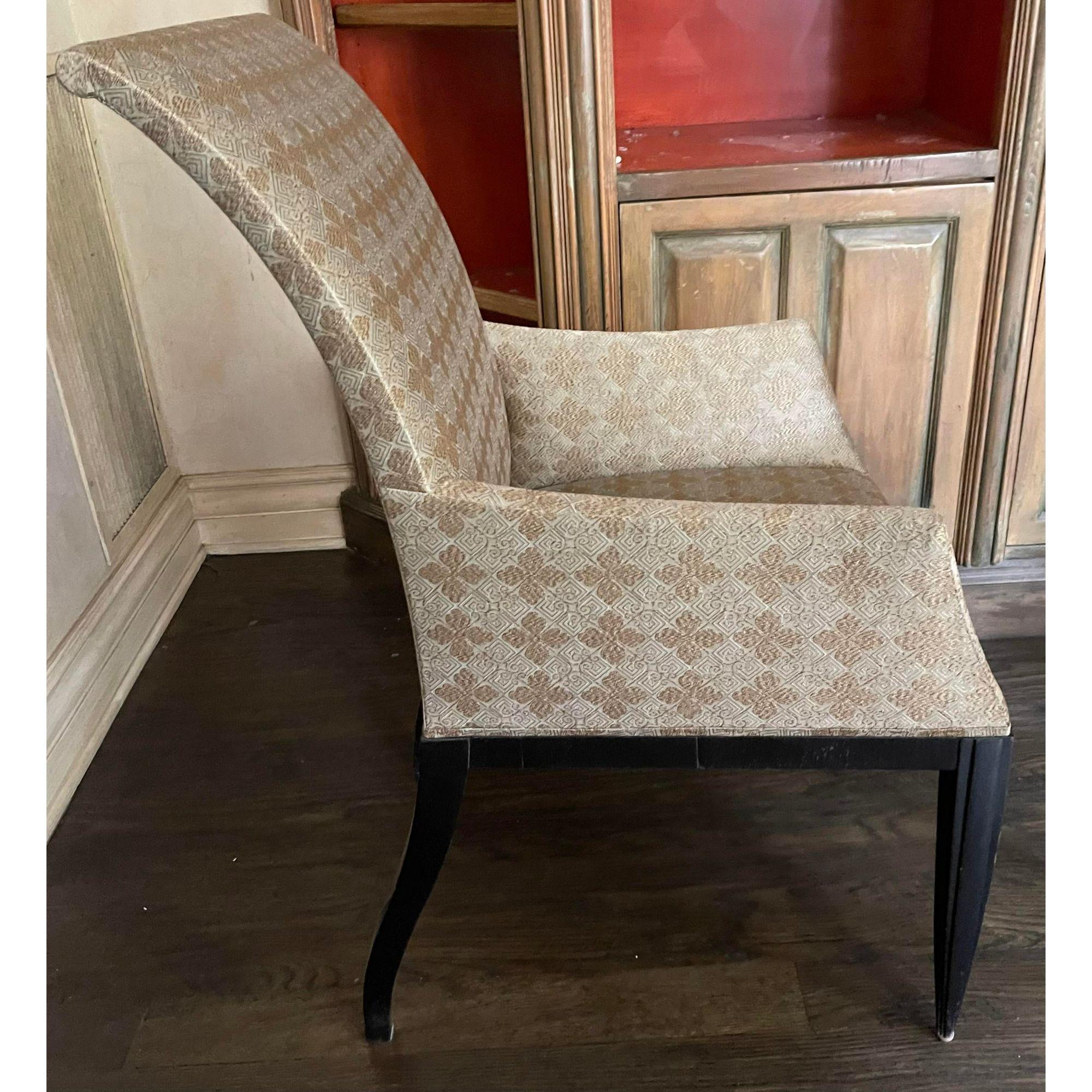 Priced each. Modern Gerard for Dessin Fournir Dining Arm Chair. It features art deco style front legs and dramatic saber legs in the back

Additional information: 
Materials: Linen, Wood
Color: Olive
Brand: Dessin Fournir
Designer: Dessin
