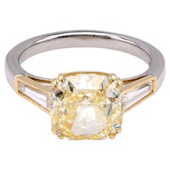 Modern GIA 3.01 Carat Fancy Yellow Cushion Cut 18K Yellow Gold and Platinum Ring