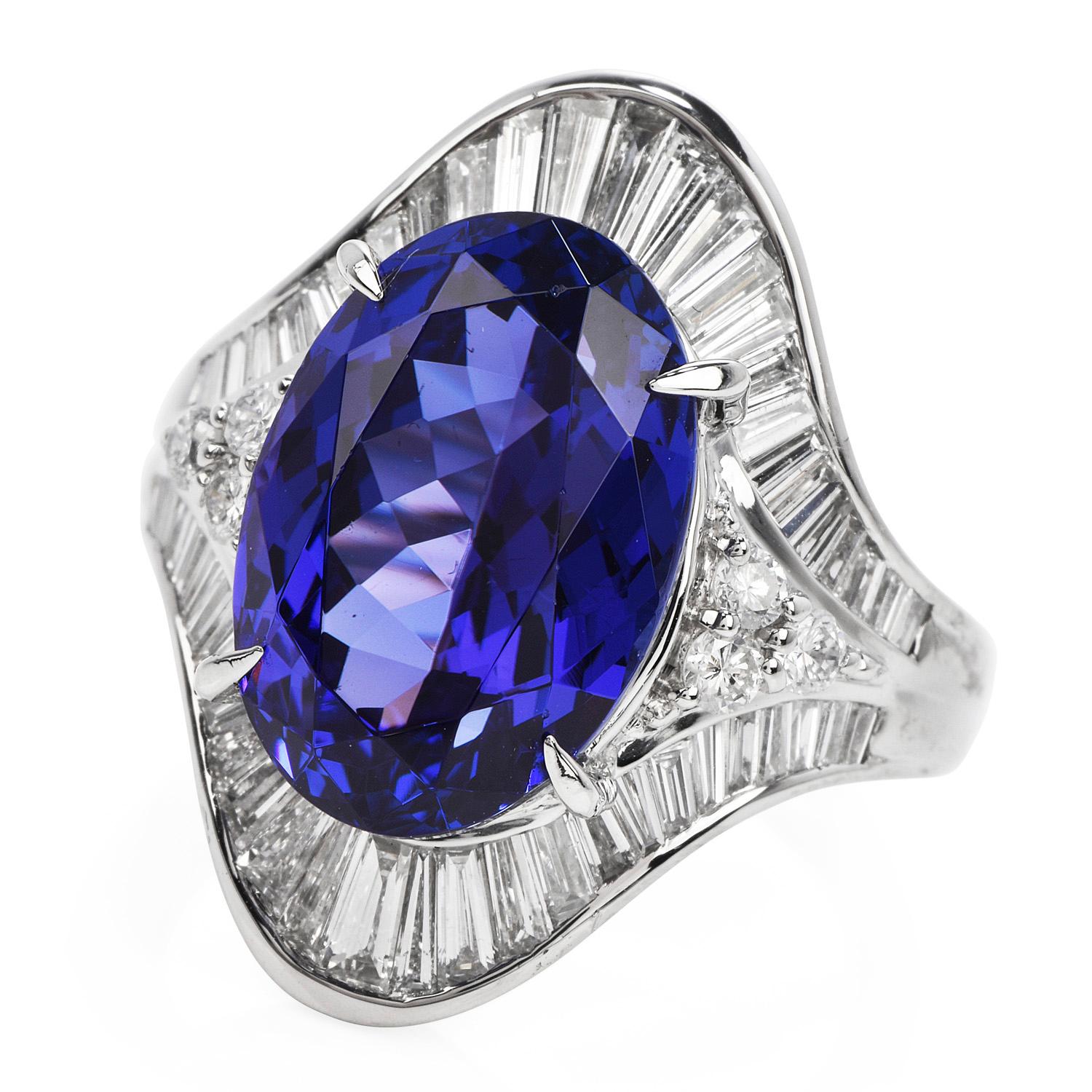 This Vibrant GIA Certified Natural Violet Tanzanite & Diamond Cocktail Ring is sure to make heads turn! 

This tanzanite gem set in solid Platinum and having an approx weight of (8.51) carats, surrounded with (52) Genuine Diamonds baguette-cut,

and