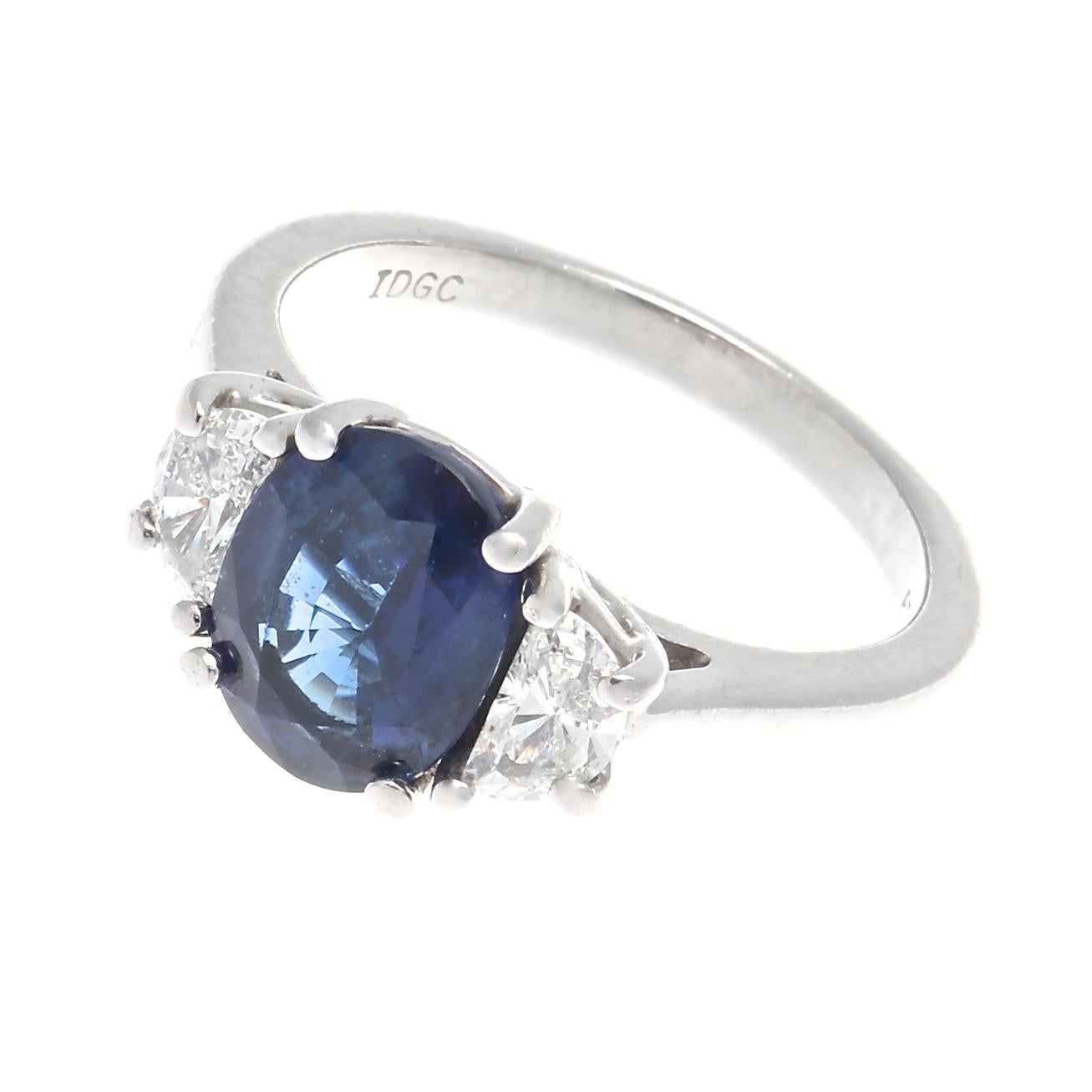 For the non-traditionalist looking for something to spice up the old tradition of the engagement ring that began centuries ago. Featuring a 2.46 carat navy blue sapphire that is GIA certified as Ceylon origin with indications of heat treatment. A