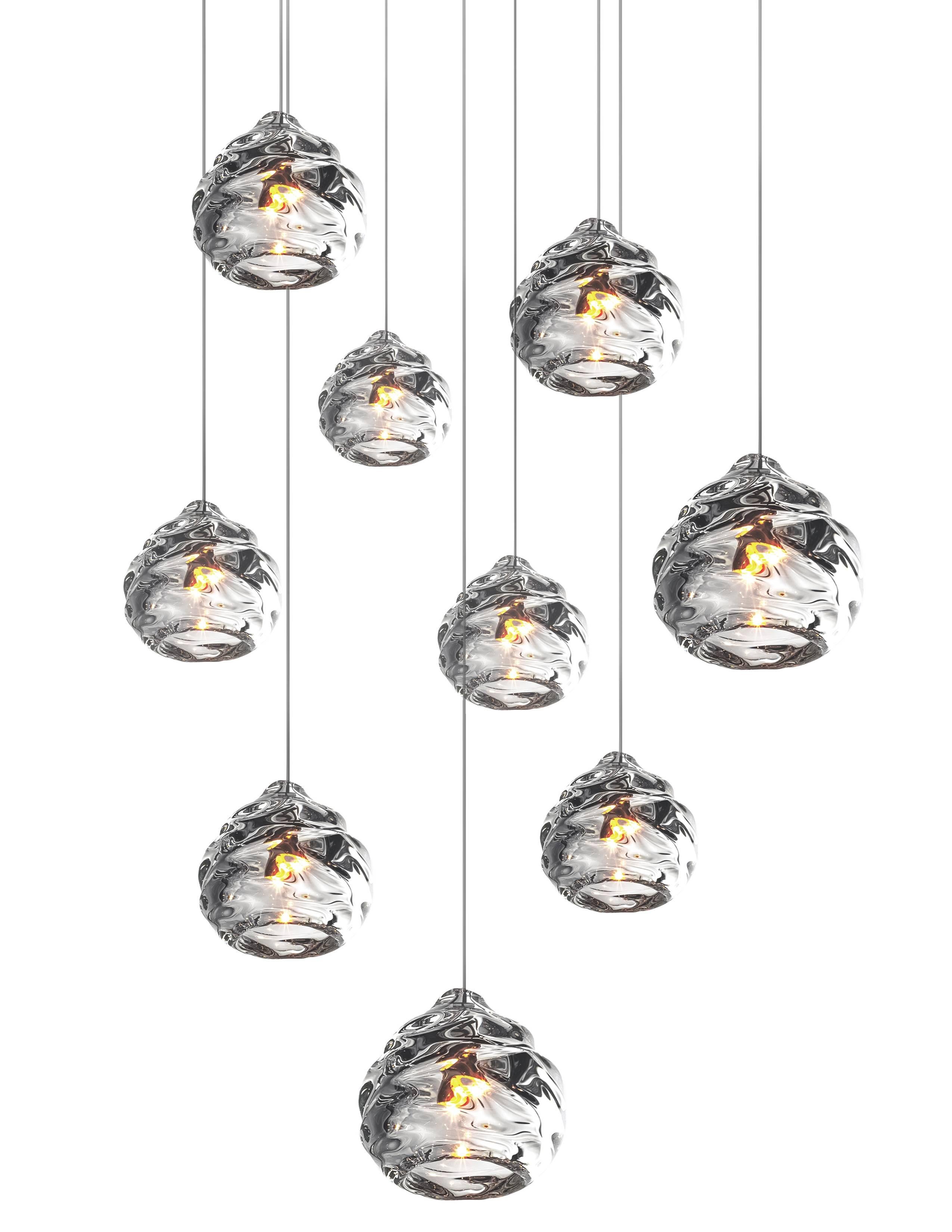 Happy light chandelier
Nine handblown glass Happy pendants.
This includes the satin nickel 16
