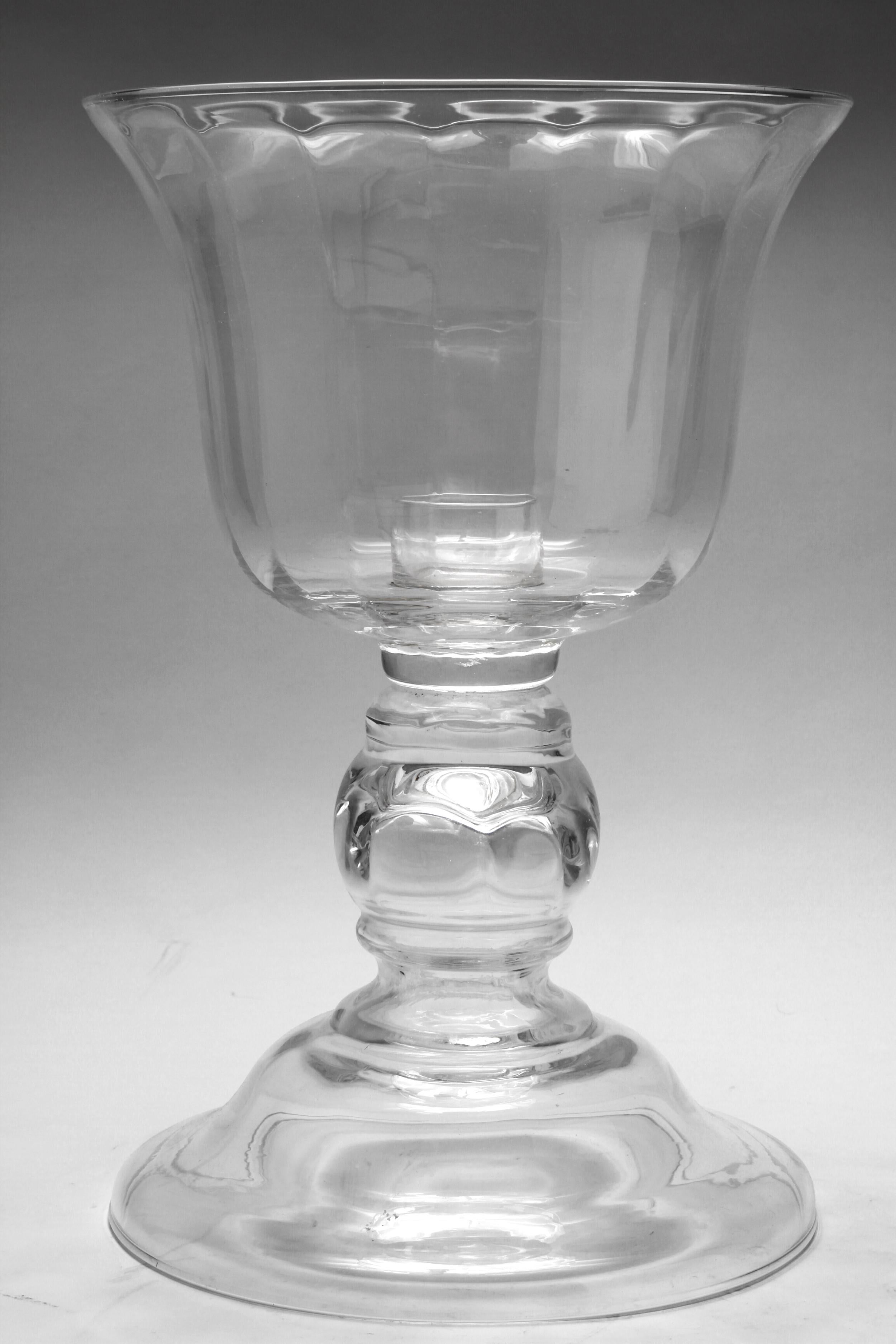 Modern colorless glass compote or candleholder, with a flared rim bowl, turned over a round base. The piece is in great vintage condition with age-appropriate wear to the bottom.