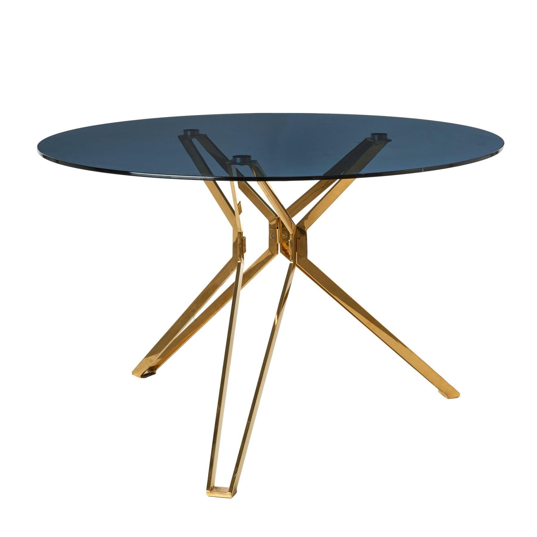 Modern glass round table, Pols Potten Studio
Dimensions: 120 diameter x height 76 cm
Materials: Powder coated stainless steel frame, tempered smoked glass


Pols Potten products are characterised by a modern twist on Traditional Design. Each of