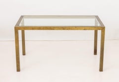 Moderner Esstisch mit Glasplatte aus Messing
