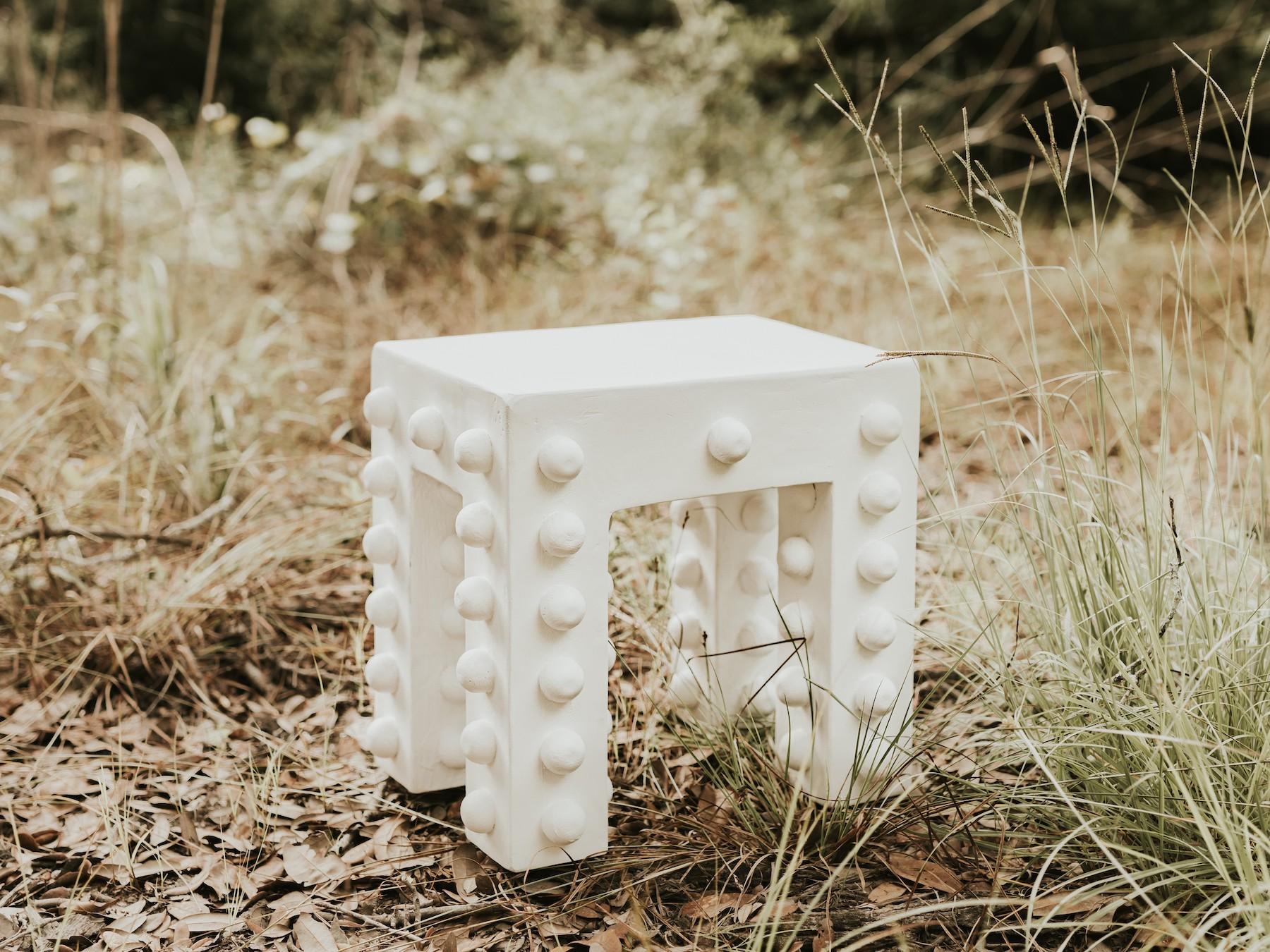 GLENN THINKING STOOL

Blurring the lines of art and purpose, the Glenn Thinking Stool is a tribute to the artistry and uniqueness of hand craftsmanship. Perfect as an accent for a living room, the Glenn is adorned with 92 sculptural cast plaster
