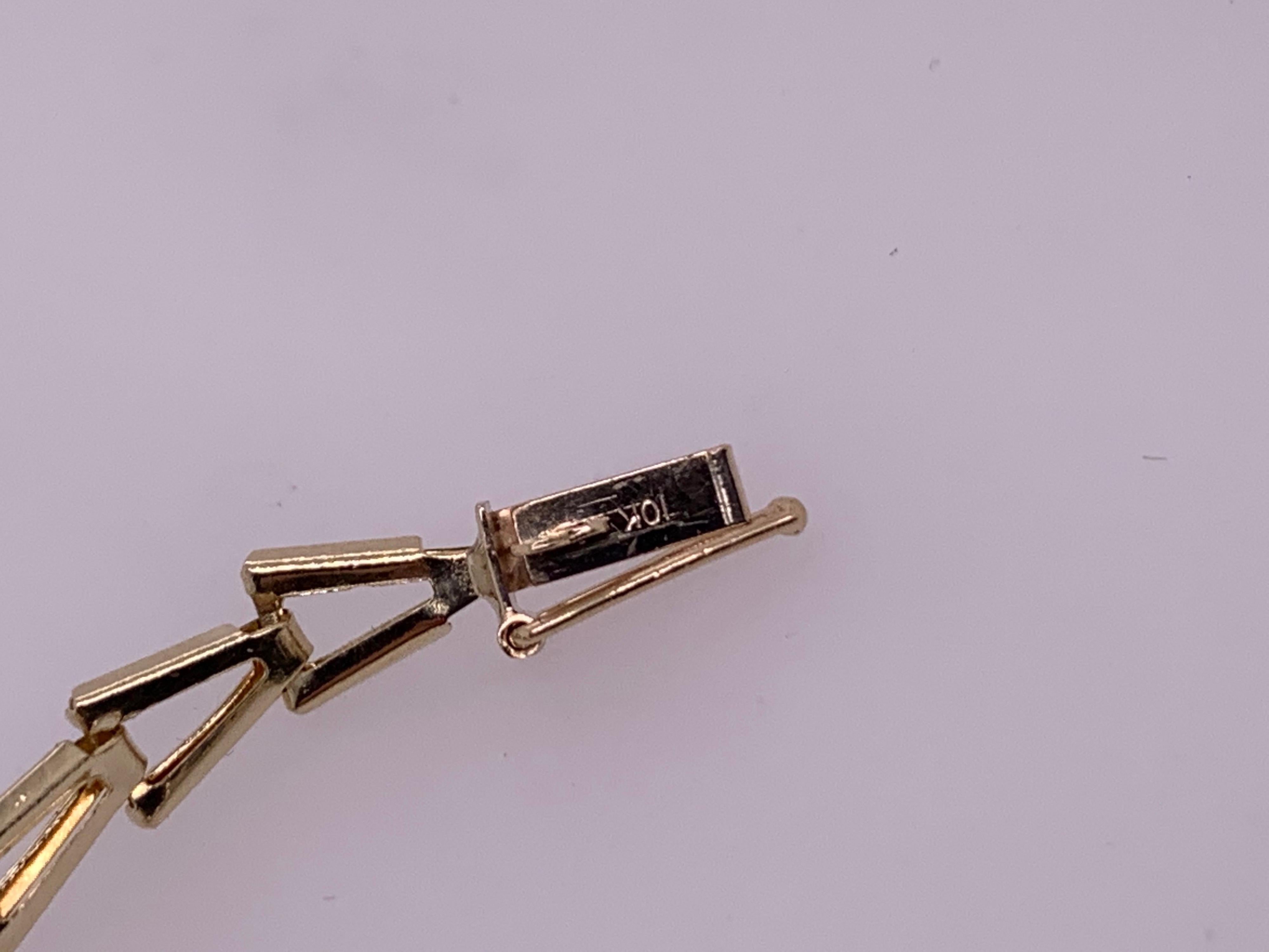 Women's Modern Gold 0.55 Carat Natural Colorless Oval Diamond and Sapphire Gem Bracelet