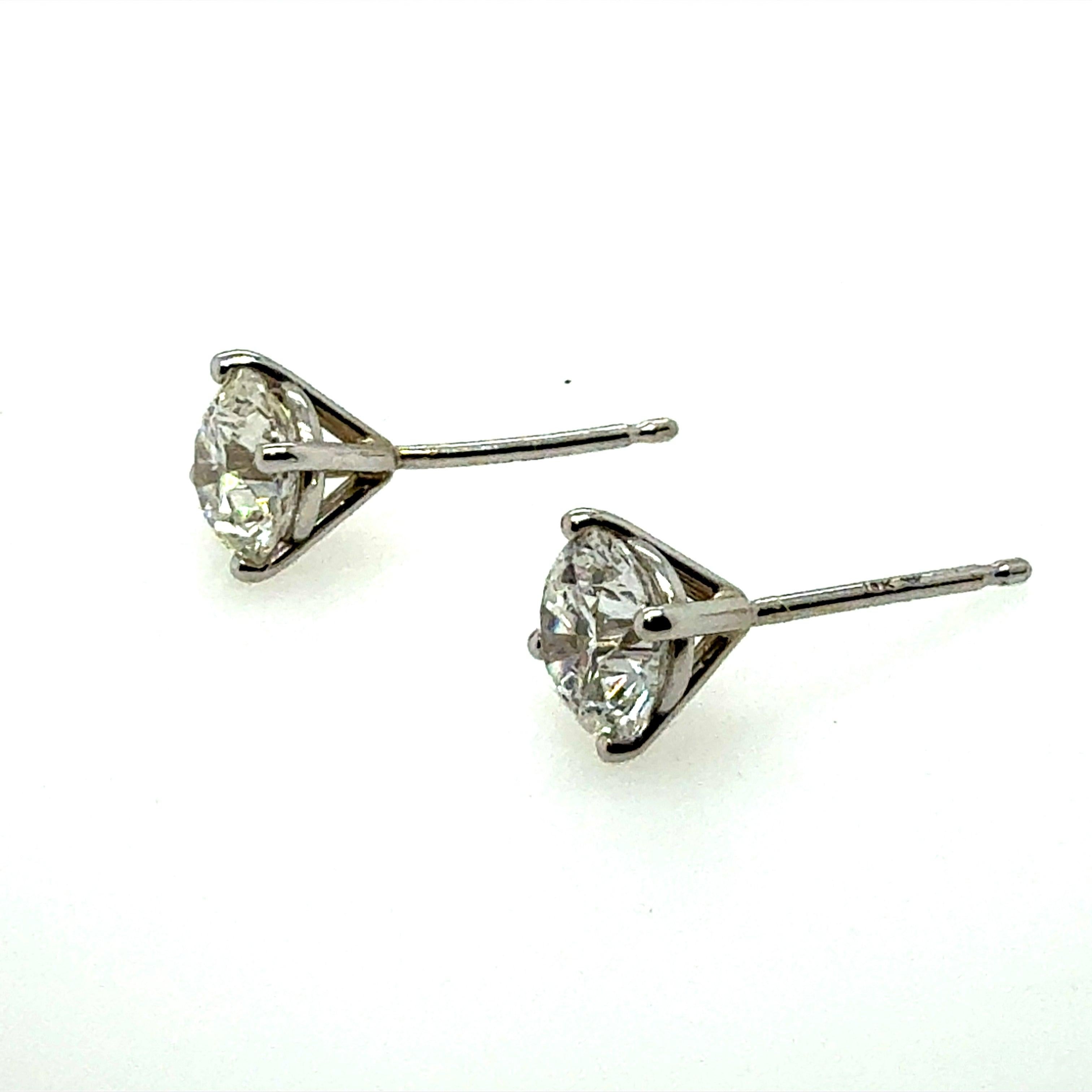 Modern Gold 1.43 Carat Natural EGL Certified E Color Diamond Stud Earrings In Good Condition For Sale In Los Angeles, CA