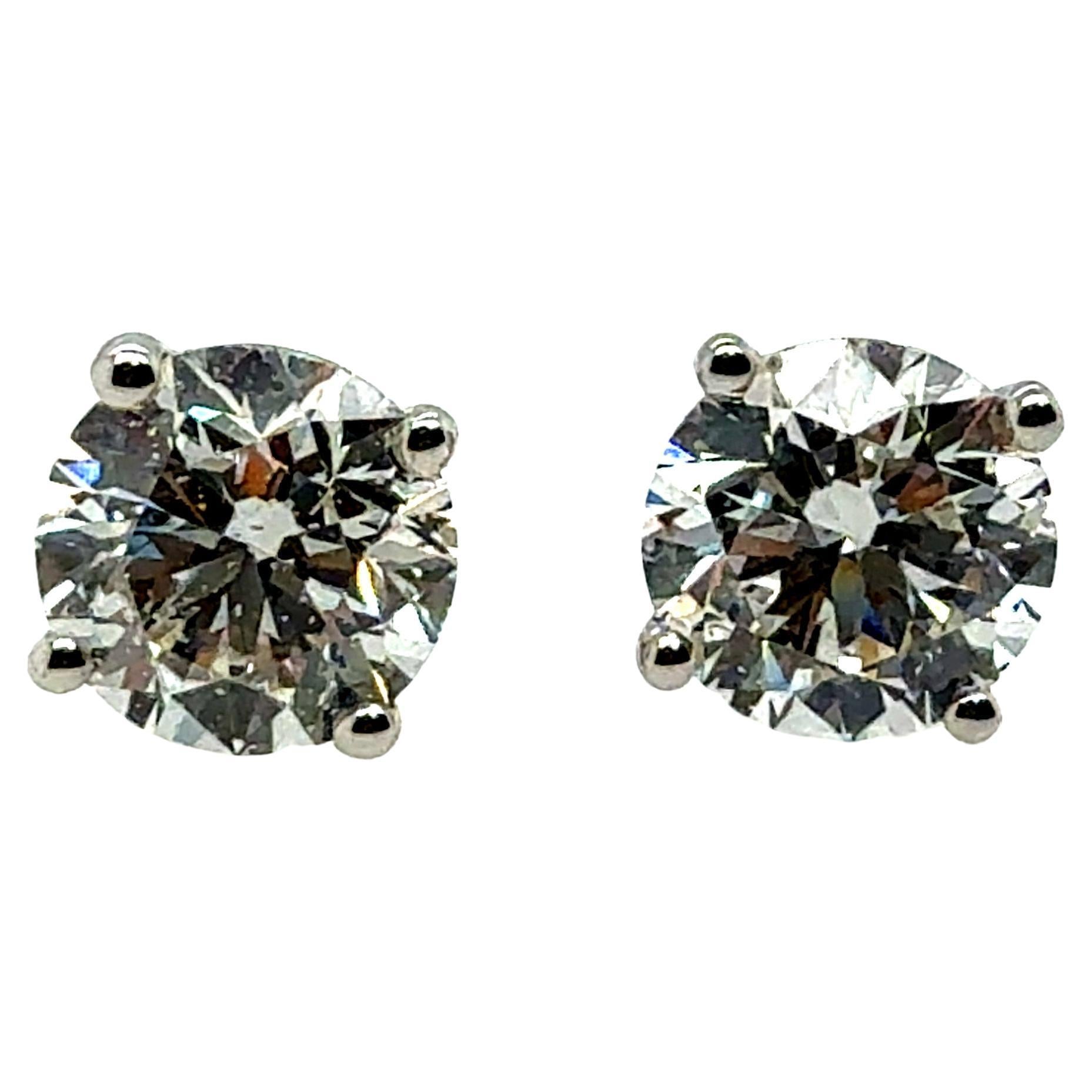 Modern Gold 1.43 Carat Natural EGL Certified E Color Diamond Stud Earrings For Sale
