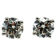 Modern Gold 1.43 Carat Natural EGL Certified E Color Diamond Stud Earrings