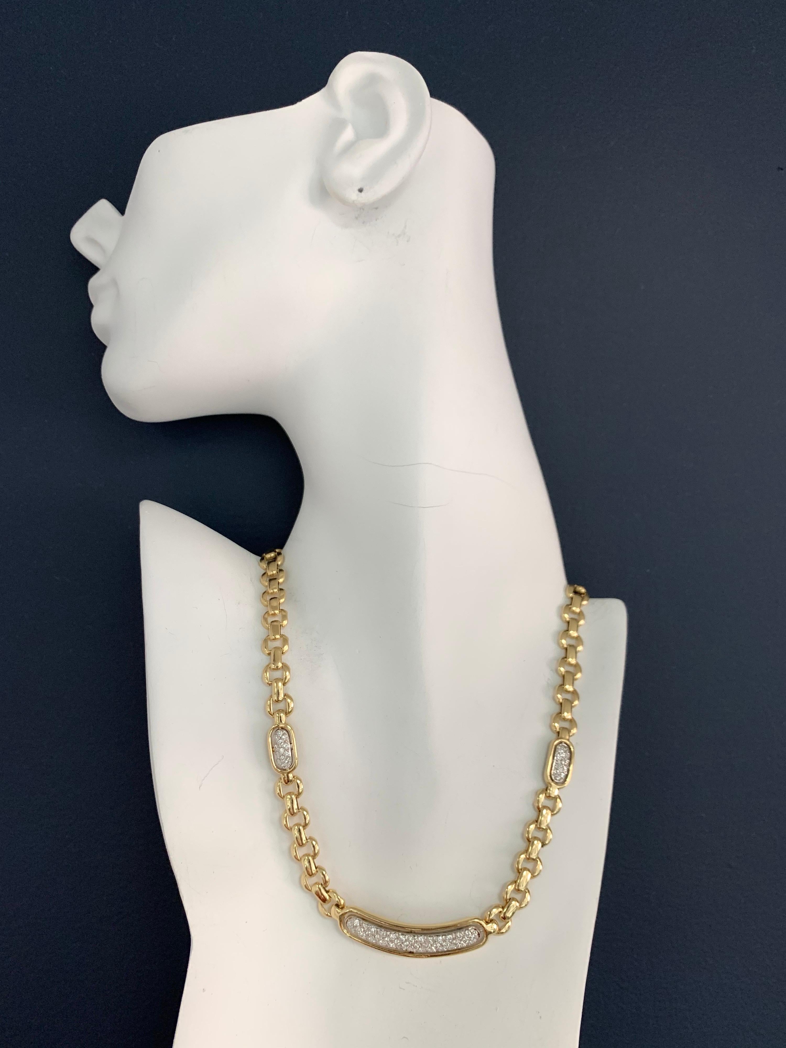 Modern 14K Yellow Gold 1.50 Carat Natural Round Brilliant Diamond Necklace, Made in Italy, circa 1980. The 66 natural round brilliant diamonds are approximately G-H in color and VS-SI in clarity. 

The length of the necklace is 16.5
