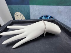 Bracelet tennis moderne en or avec diamants ronds brillants naturels incolores de 2.42 carats