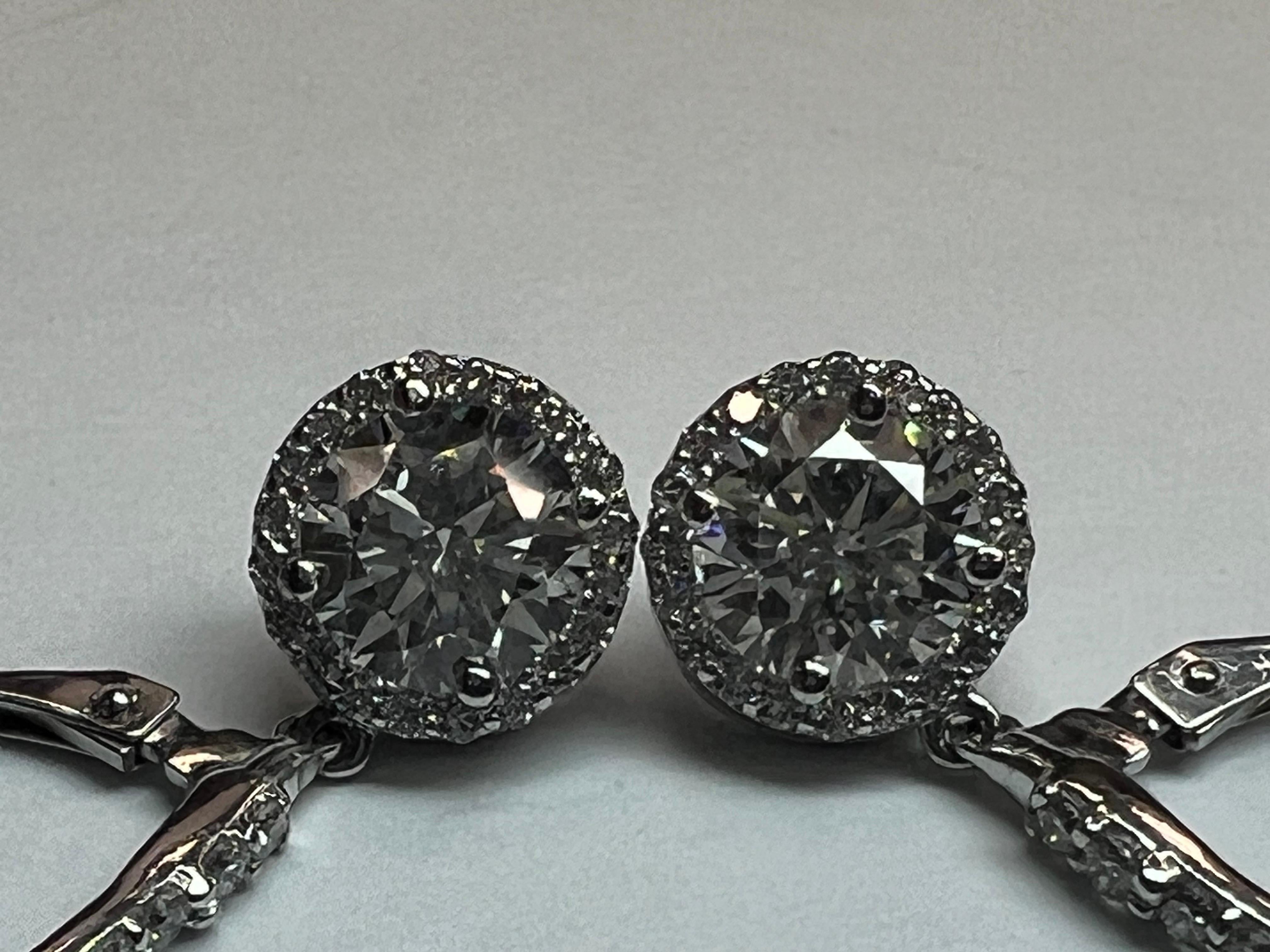 Modern Gold 2.7 Carat EGL USA Certified Natural Round Colorless Diamond Earrings For Sale 6