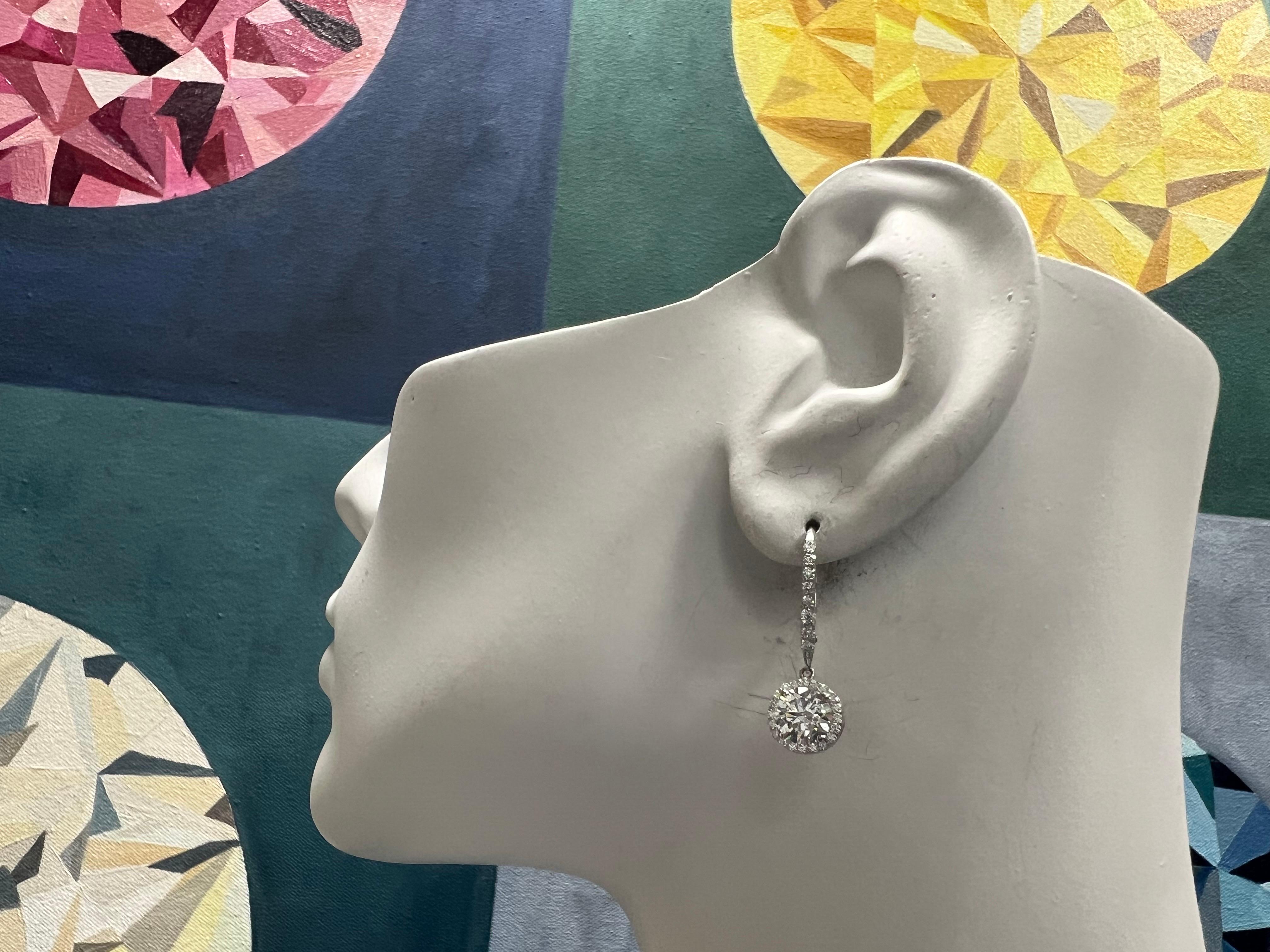 Modern Gold 2.7 Carat EGL USA Certified Natural Round Colorless Diamond Earrings For Sale 1