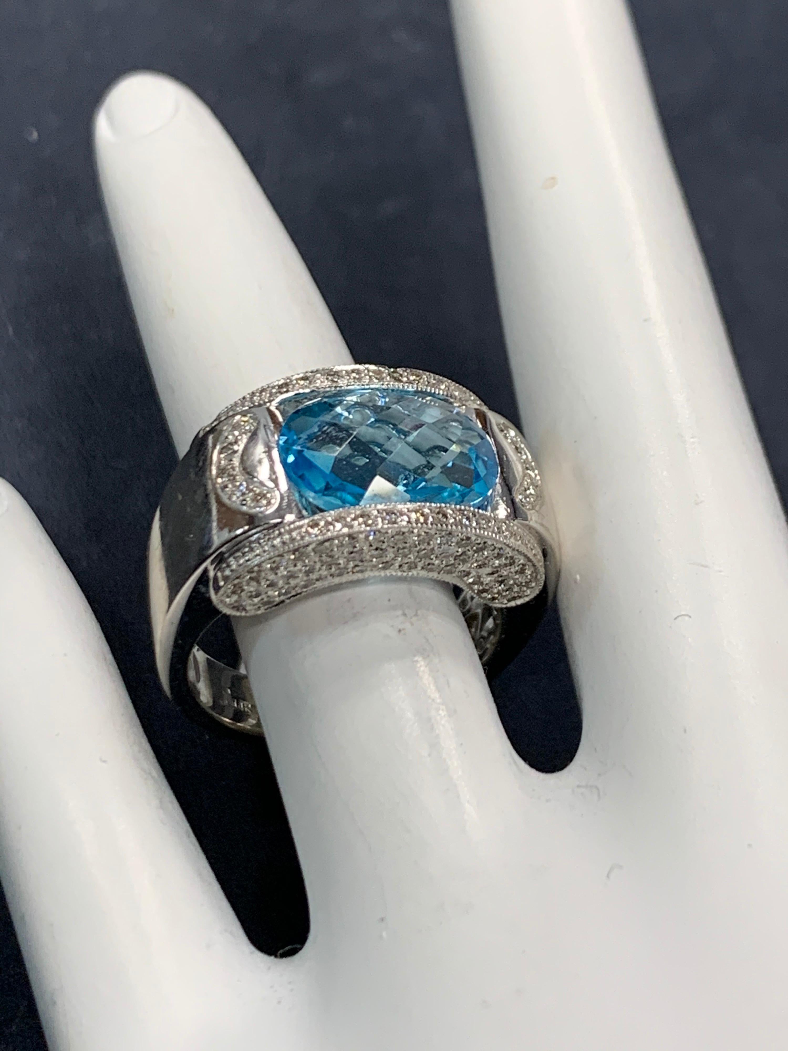 Oval Cut Modern Gold 5.43 Carat Natural Oval Blue Topaz & Colorless Diamond Cocktail Ring