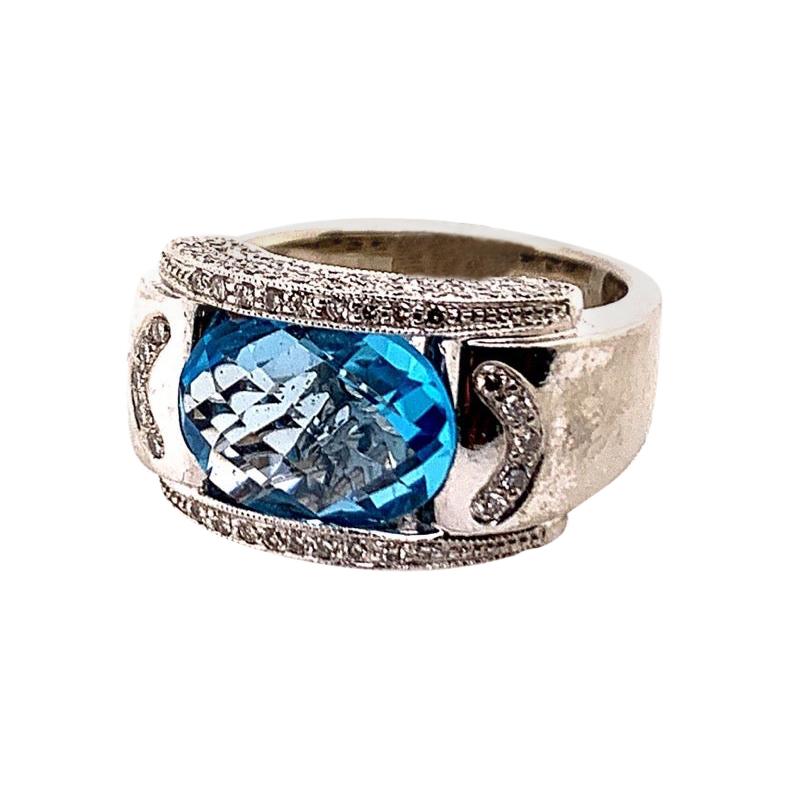Modern Gold 5.43 Carat Natural Oval Blue Topaz & Colorless Diamond Cocktail Ring
