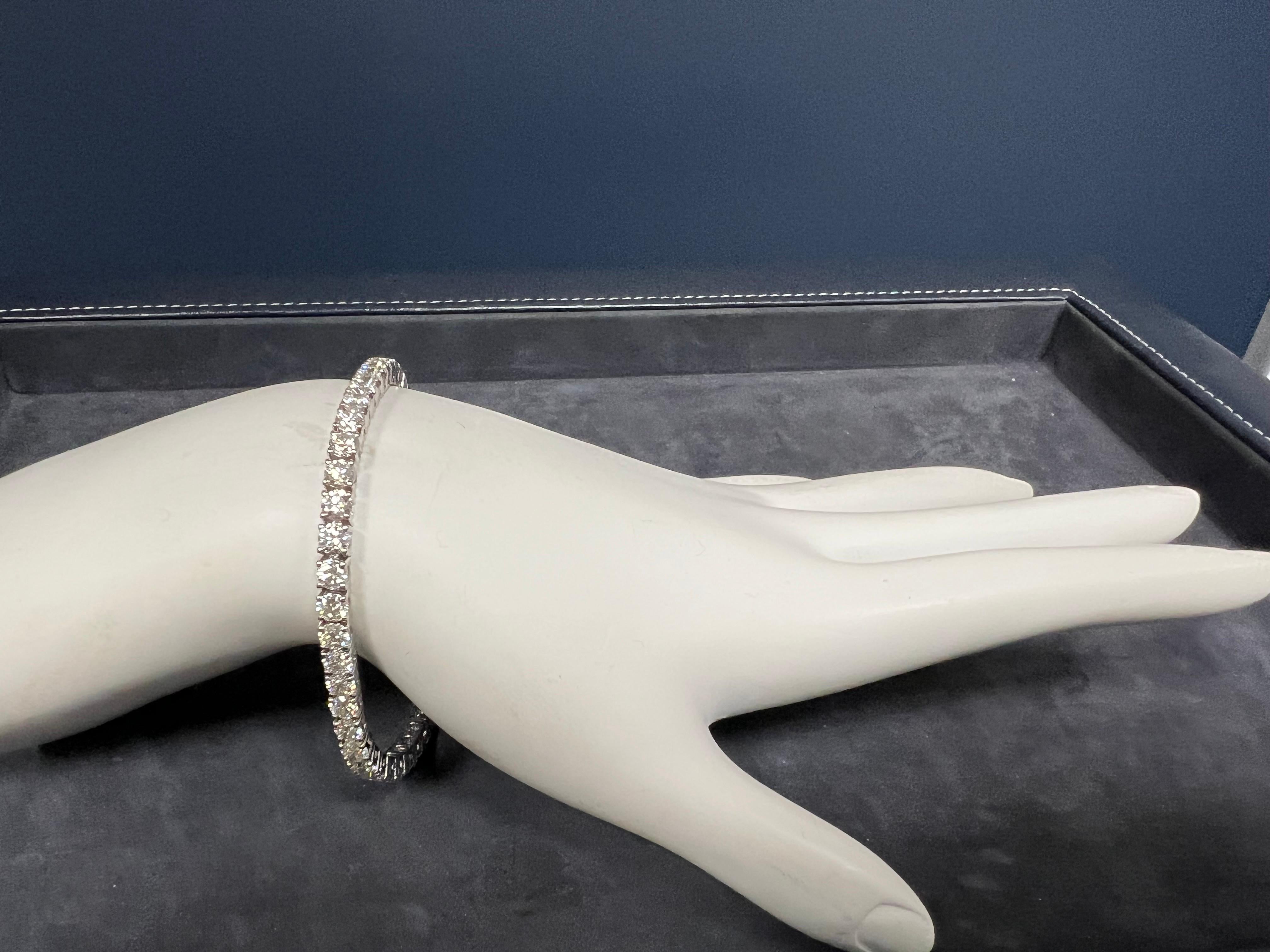 Modern 18k White Gold 8.72 Carat Natural Round Brilliant Colorless Diamond Tennis Bracelet.

The piece is set with 48 natural round brilliant diamonds approximately G-H in color and VS-SI in clarity. 

The bracelet weight 14 grams and is 7 inches in