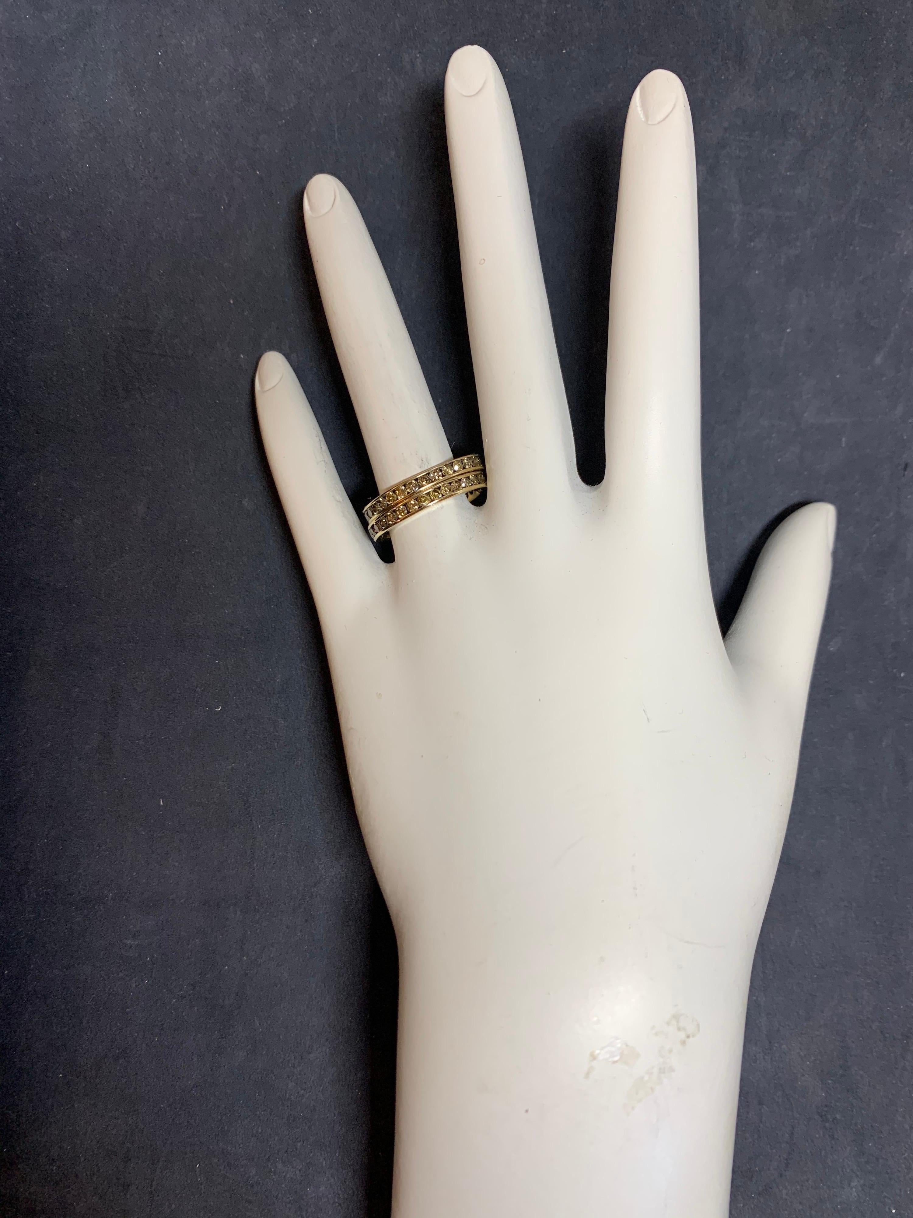 Modern Yellow Gold Matching Band Set. 

Each band is set with 32 Natural Champaign Diamonds weighing 1.13 carats each, 2.25 Carats Total. Weights are approximate. 

Ring size is 6.75++, weight is 1.7 grams each (3.4 grams total). Width is 2.6mm.
