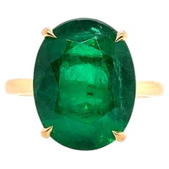 Modern Gold GIA Certified 6.53 Carat Natural Oval Zambian Green Emerald Ring