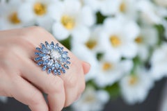Modern Gold Kinetic Flower Petal White Diamond and Blue Sapphire Cocktail Ring