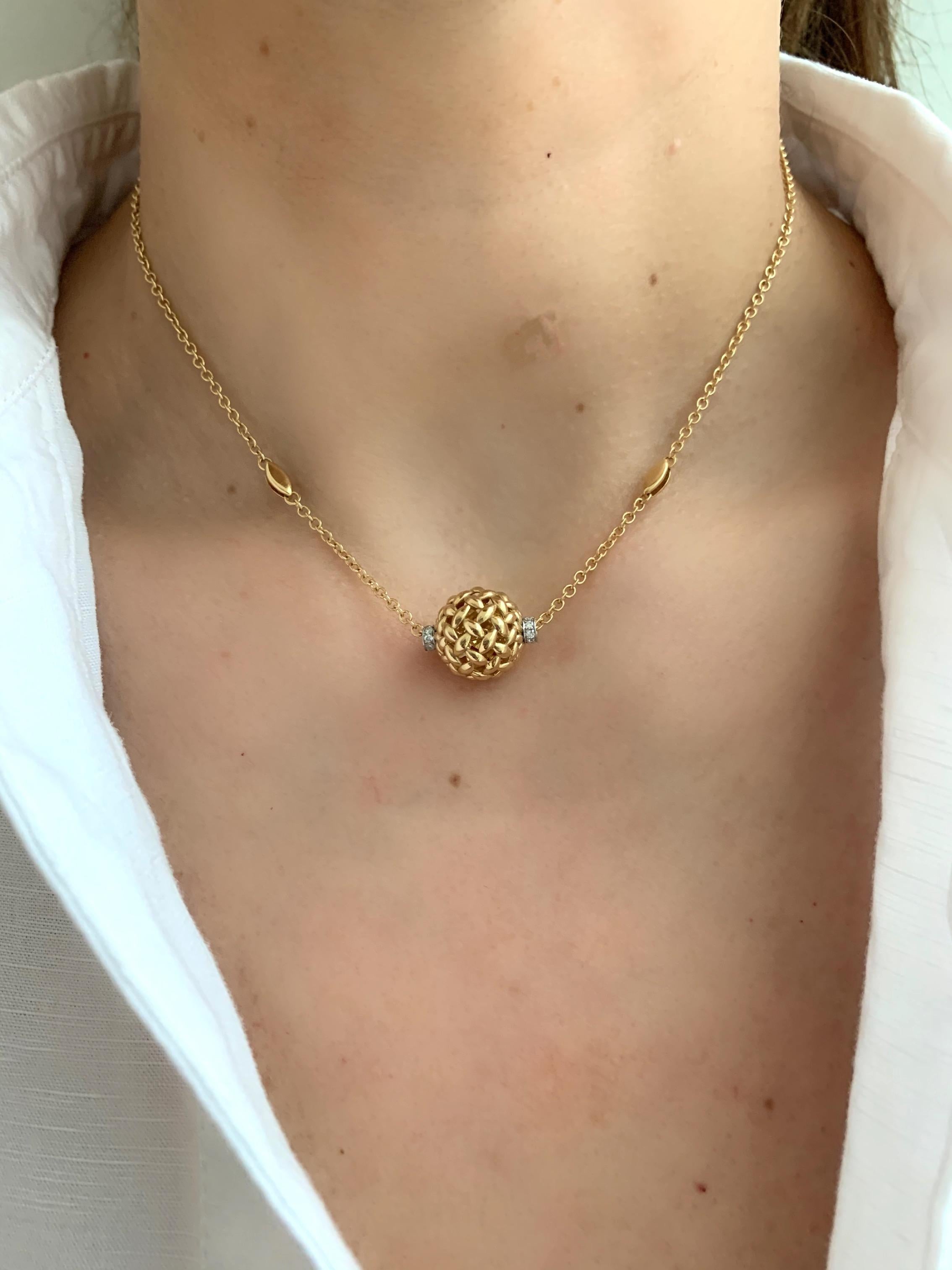 Round Cut Modern Gold Kinetic Flower Twist Diamond Pendant Necklace For Sale