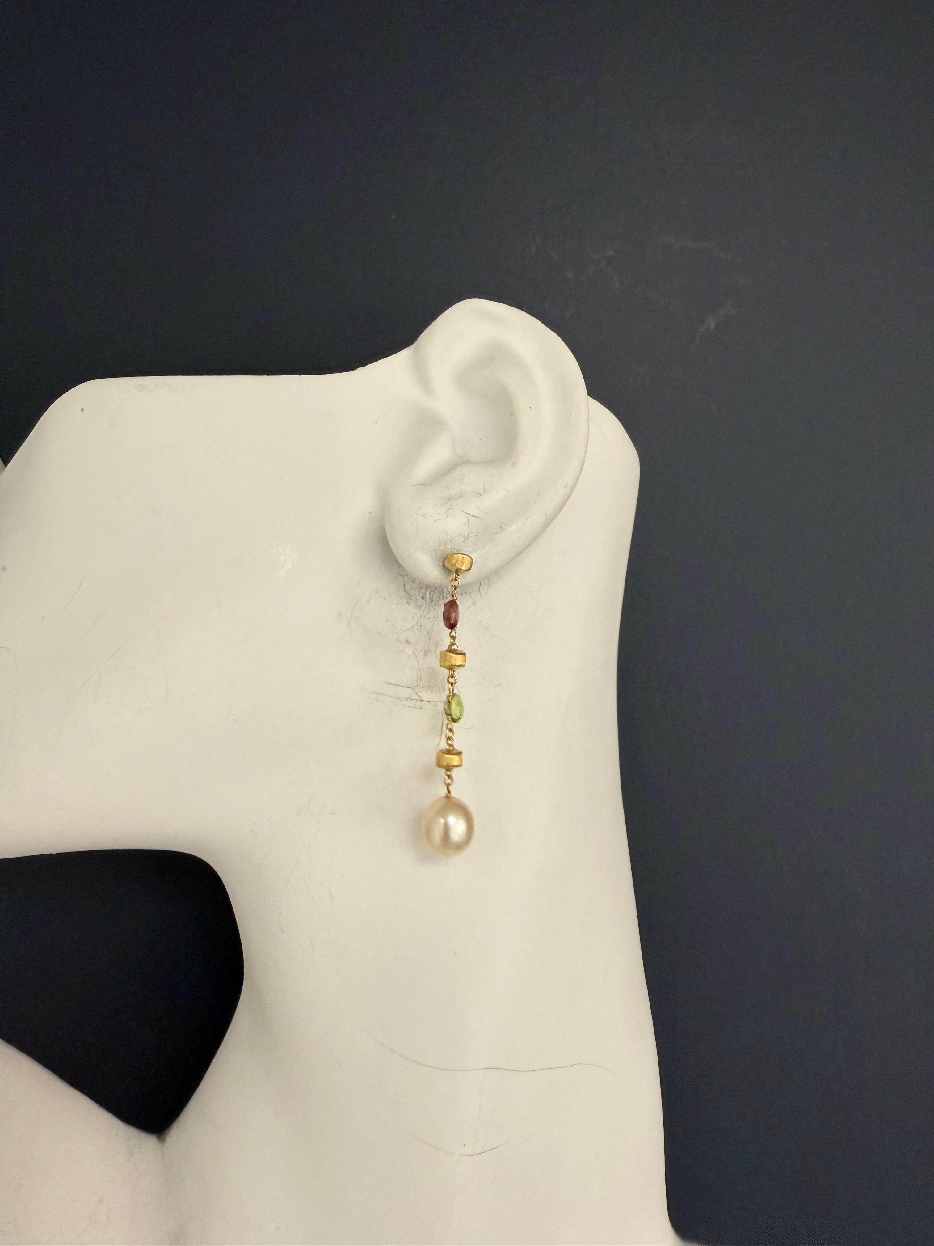 Modern 18K yellow gold multicolor drop earrings by Italian designer Marco BICEGO. Featuring a luminous 8.5 mm natural pearl, these elegant earrings measure 2 inches in length and weigh a total of 4.7 grams.
 
Three Disclaimers / Special Notes: