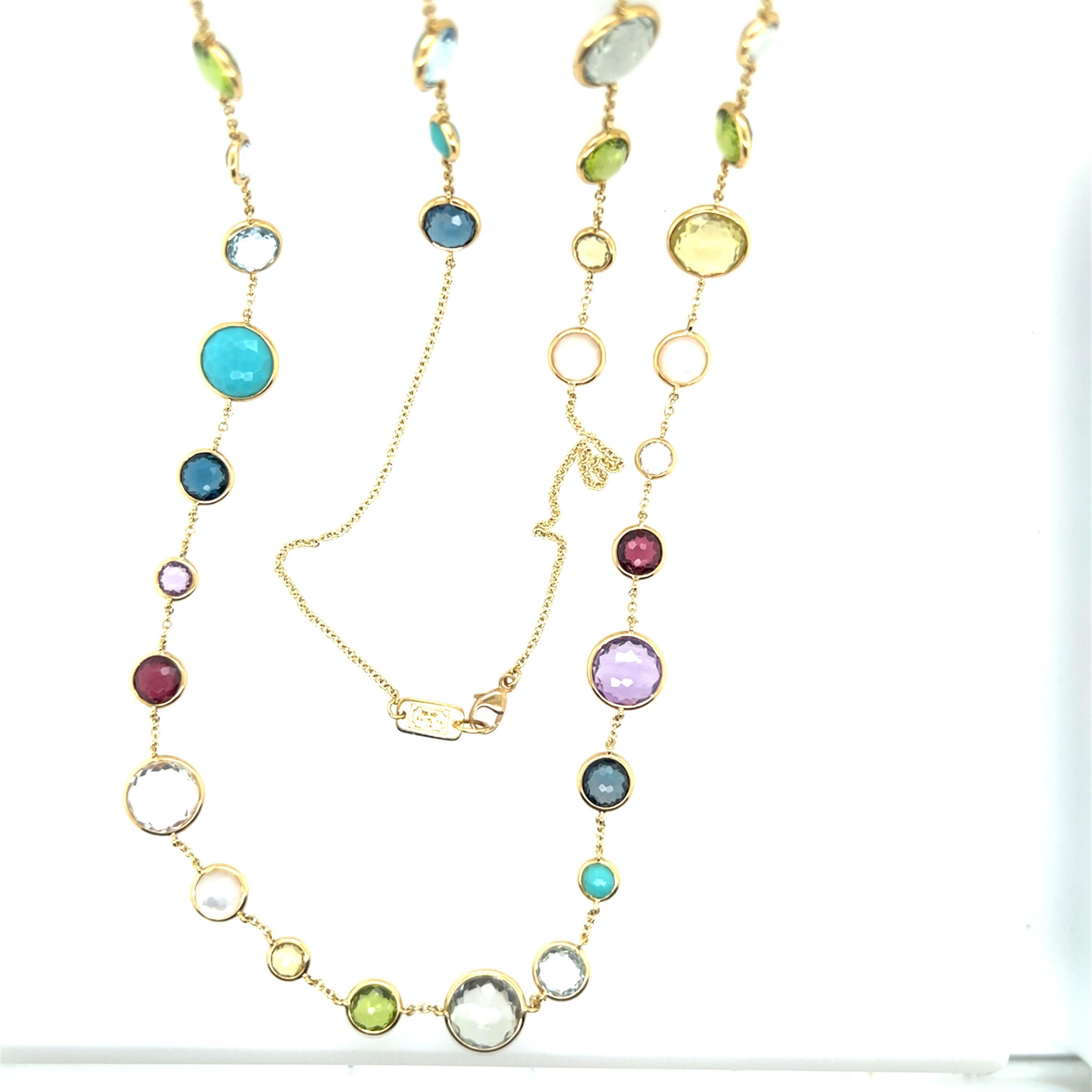Collier Lollipop moderne en or signé Ippolita avec pierres multicolores arc-en-ciel de 36 pouces

La pièce est sertie de 47 pierres précieuses. Les deux faces des gemmes sont facettées. Citrine, péridot, topaze bleue, améthyste, tourmaline