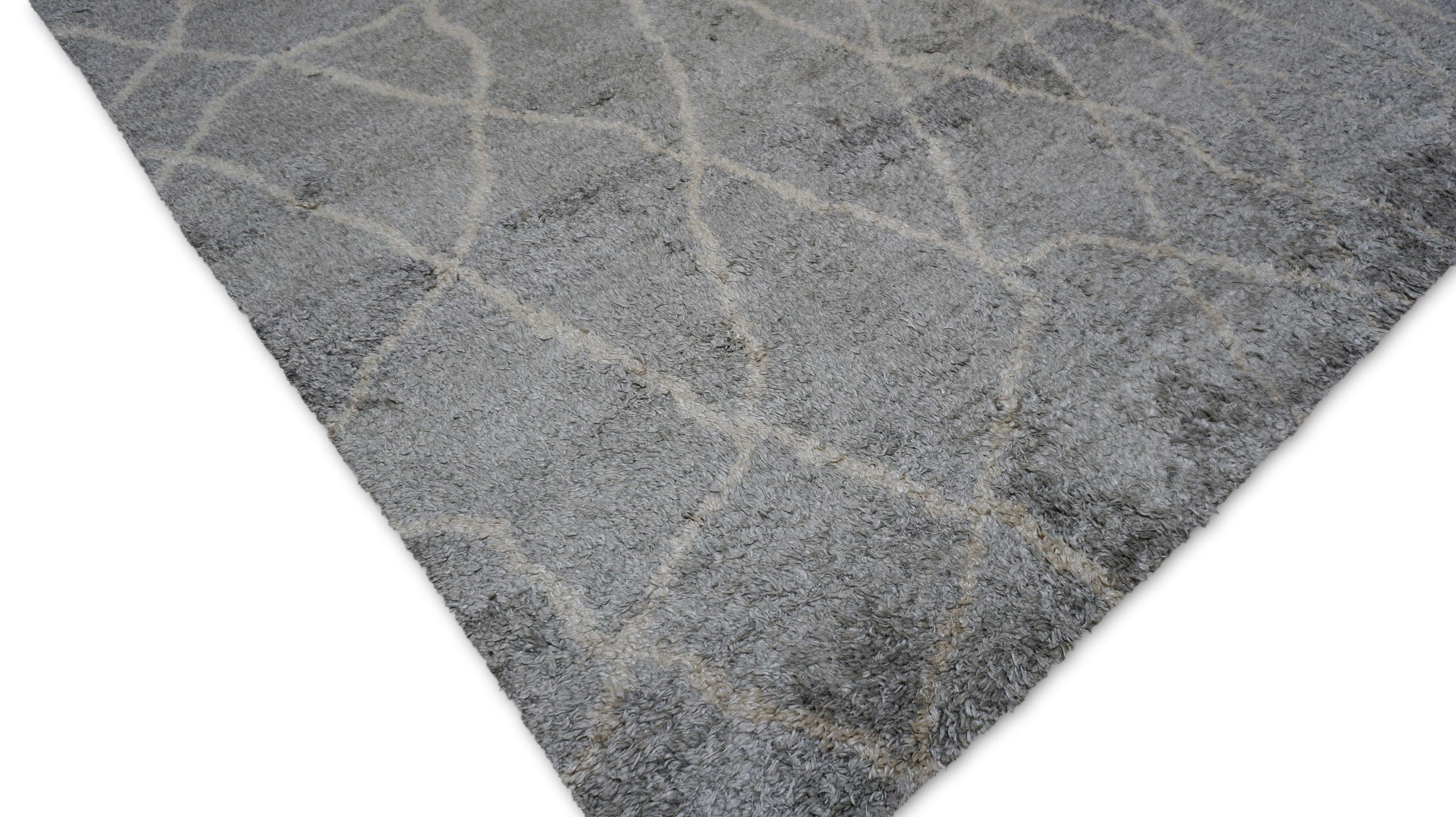 This exquisite hand-knotted bamboo rug is a contemporary reinterpretation of the iconic Moroccan Beni Ourain aesthetic, celebrated for its understated elegance and abstract geometry. Skillfully woven by master artisans using age-old knotting