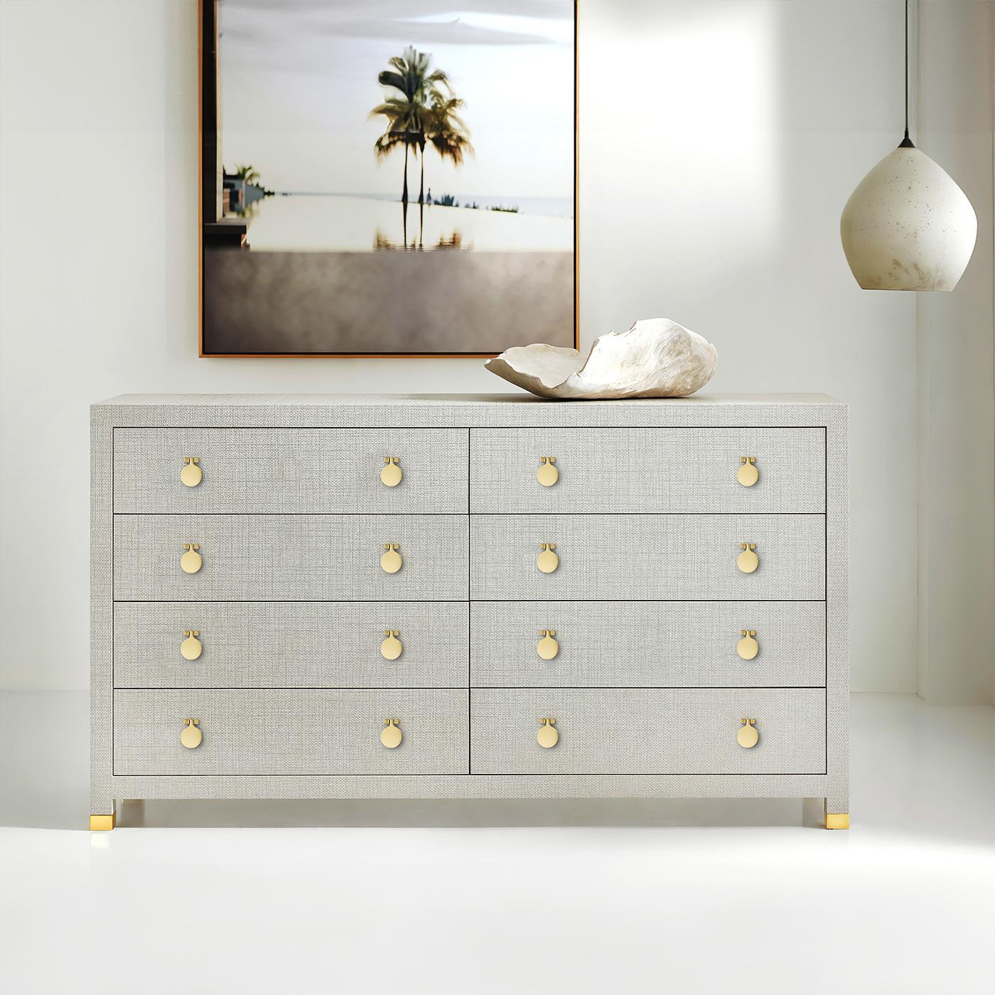 Modern Light Gray Weaved Eight Drawer Dresser. With a light gray weaved vinyl wrapped frame, oak secondary wood drawer construction, soft close drawers, and polished solid brass hardware and feet.

Dimensions: 72