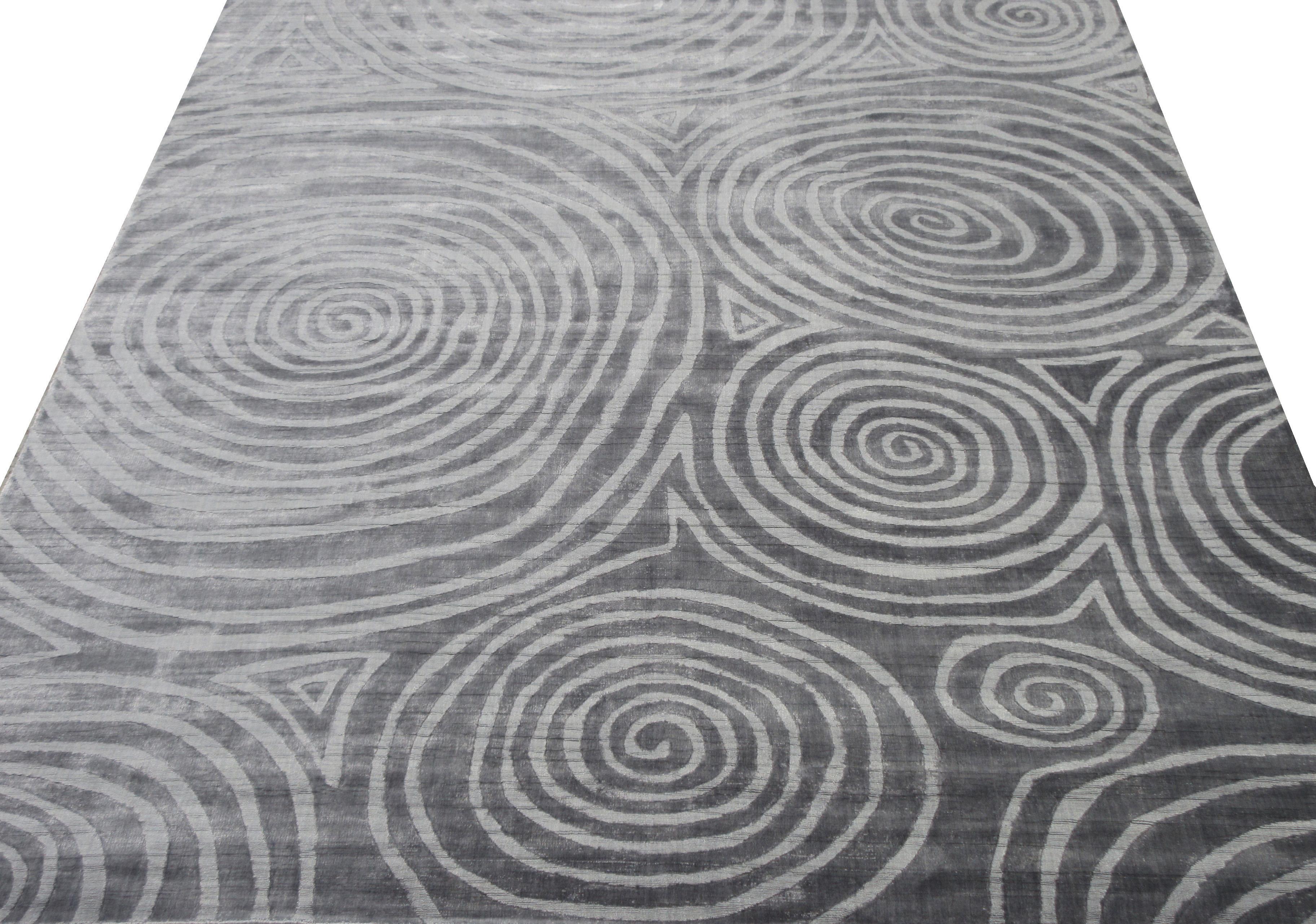 Handmade art silk pile on a cotton foundation.

Modern spiral design

Dimensions: 7'10