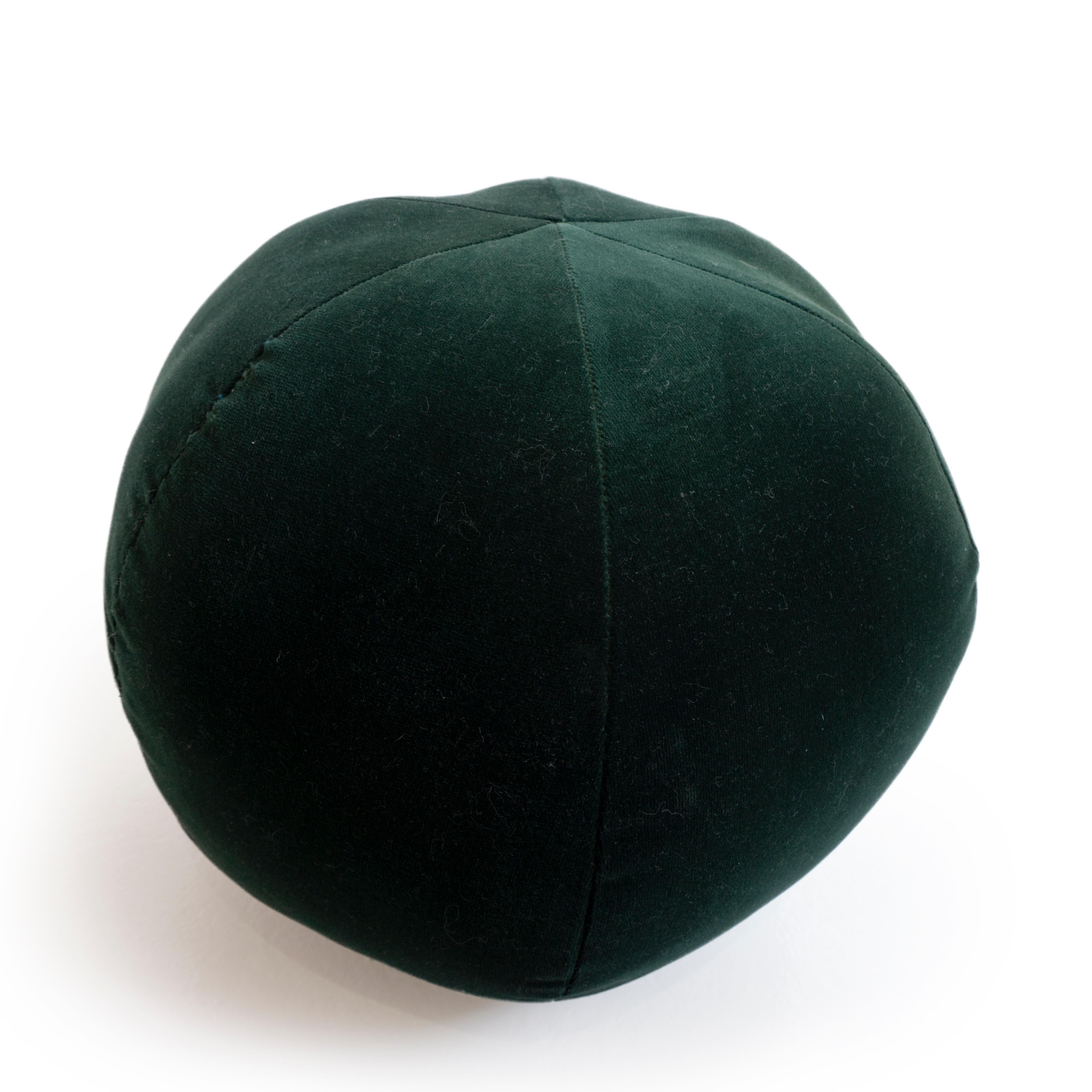 This round ball throw pillow was hand sewn at studio in Norwalk, CT. The pillow is made with a soft forest green velvet.

Measurements: 9