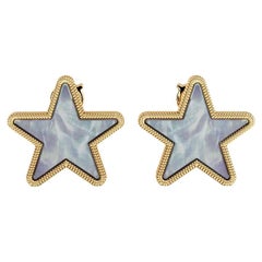 Boucles d'oreilles étoile modernes en or 18 carats et nacre grise