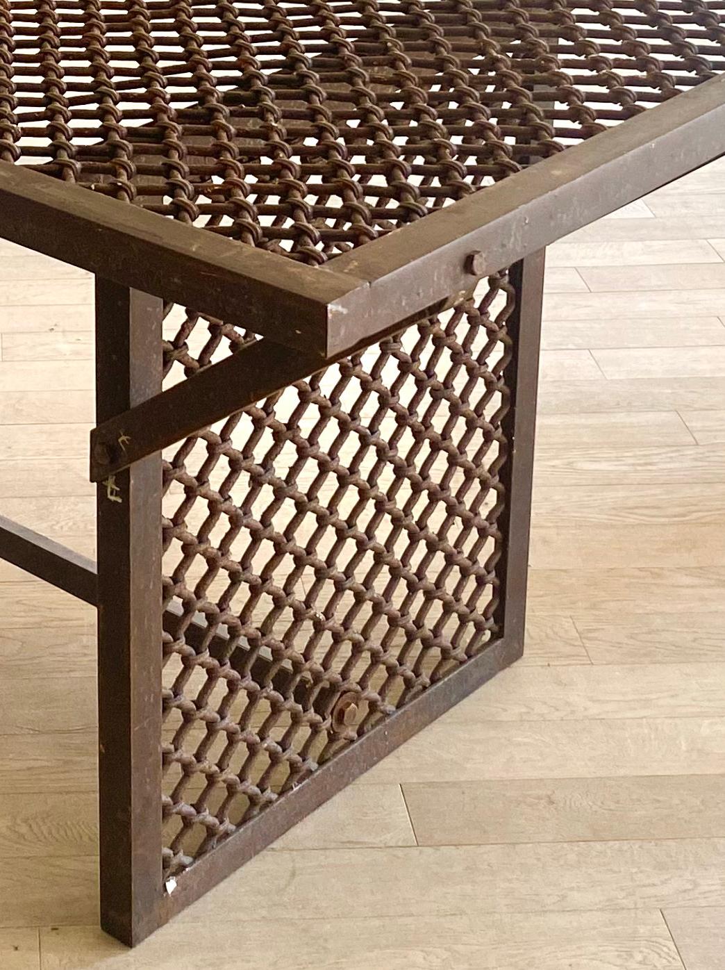 Hand-Crafted Modern grill-work iron table For Sale