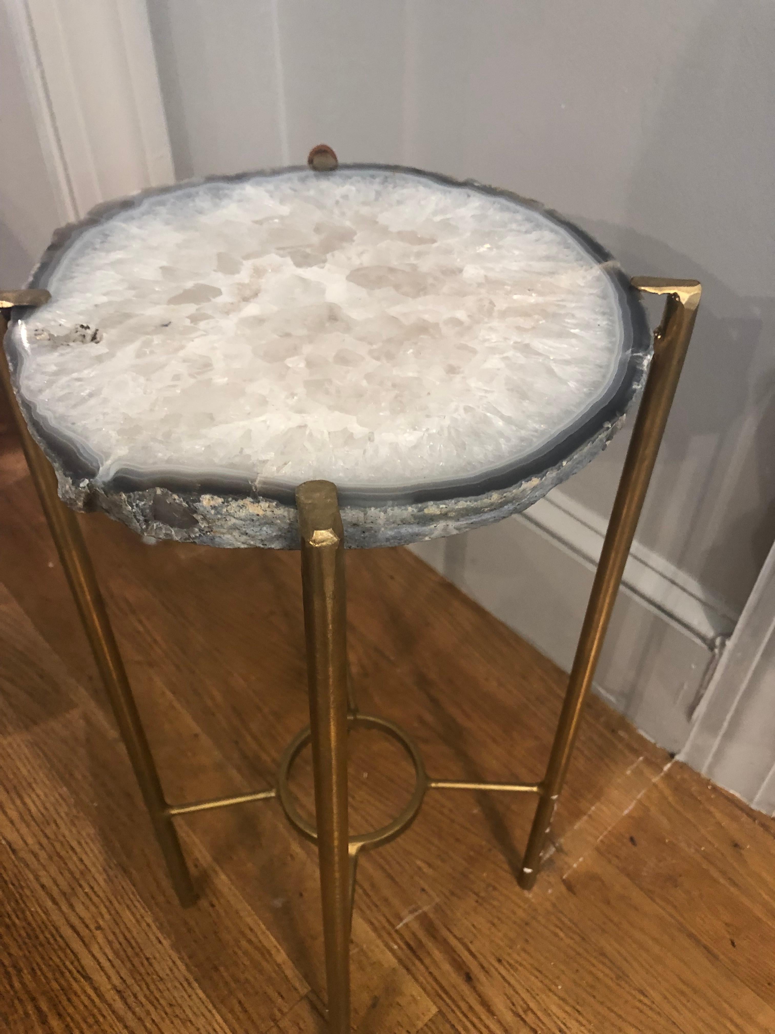 Unusual modern handcrafted drinks table. Quartzite Geode top with gilded steel base.