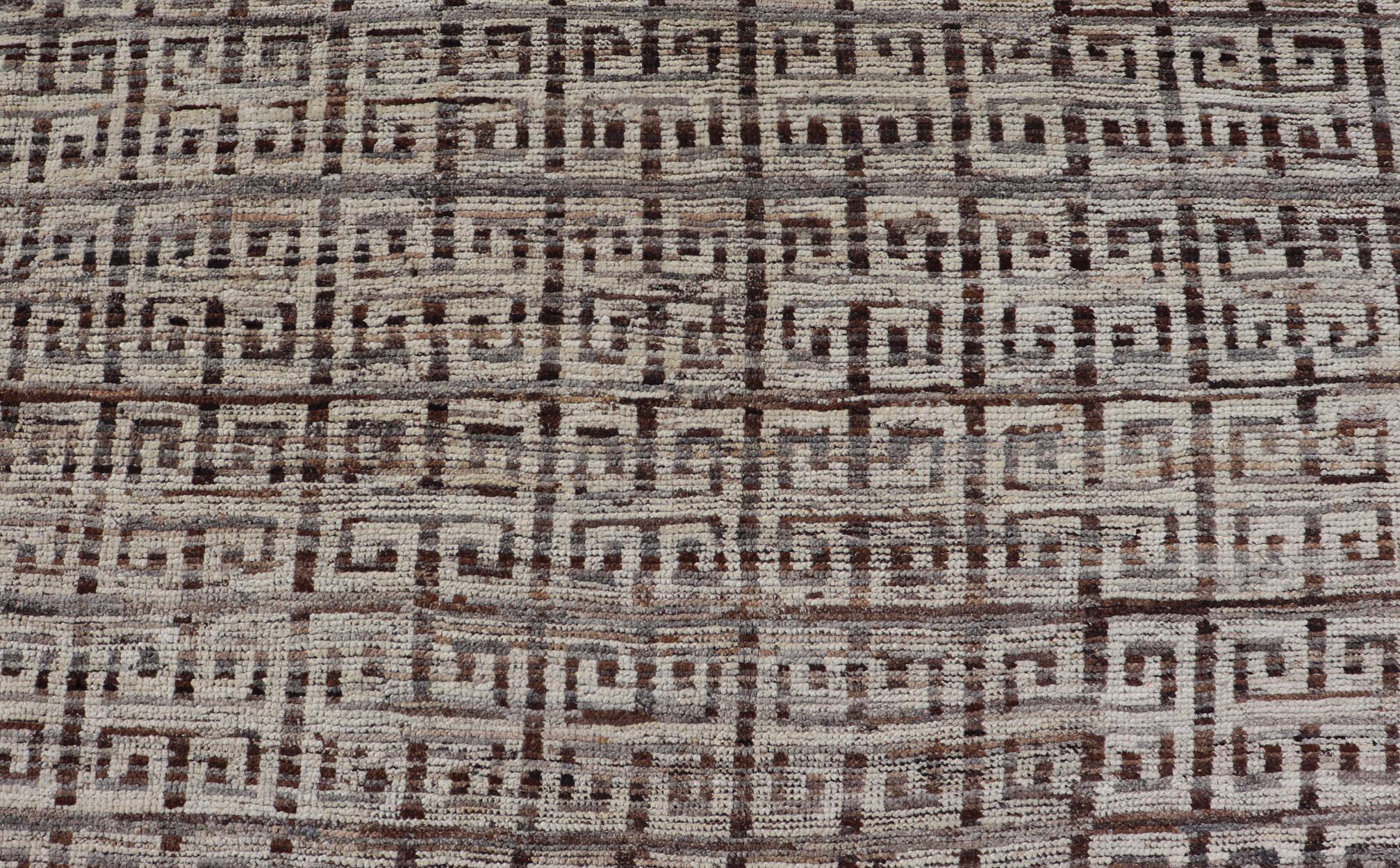 This modern casual rug has been hand-knotted. The rug features a modern all-over geometric Greek key design, rendered in earthy tones; making this rug a superb fit for a variety of classic, modern, casual and minimalist interiors.
Measures: 10'8 x