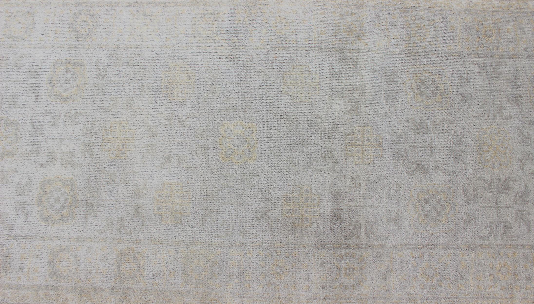 Modern Hand-Knotted Khotan Runner in Wool with Sub-Geometric Design.

Measures: 2'6 x 12'0.  

This modern hand knotted wool Khotan rug has been made by Keivan Woven Arts and features an all-over, sub-geometric design rendered in marigold and