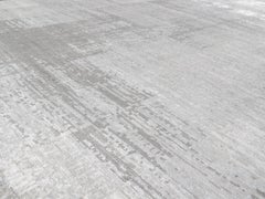 Tappeto moderno minimalista annodato a mano nei colori argento e avorio