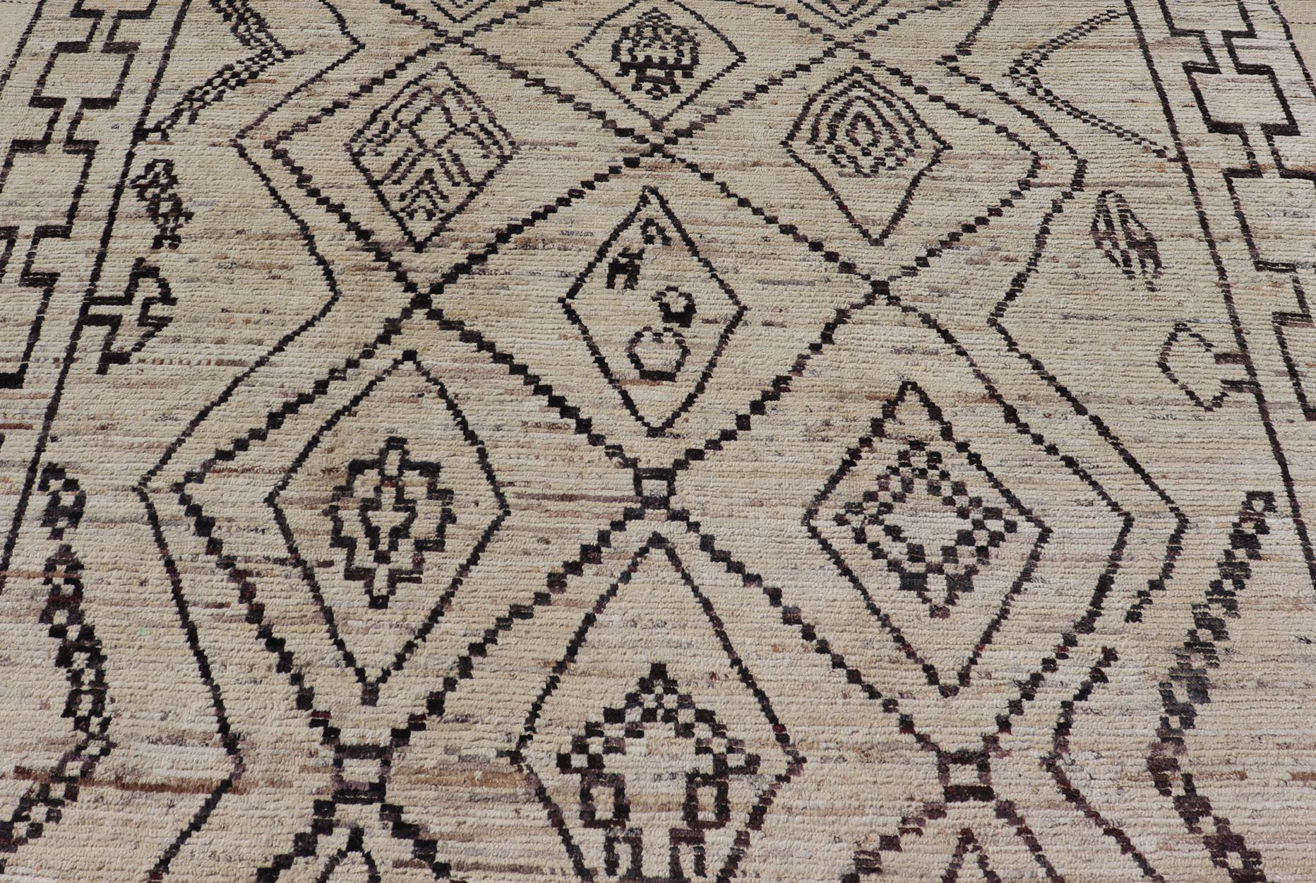The design of the rug includes a series of interconnected diamond shapes, each containing different motifs such as crosses, zigzags, and other stylized symbols. The central theme is a grid of diamond patterns that vary slightly in size and detail,