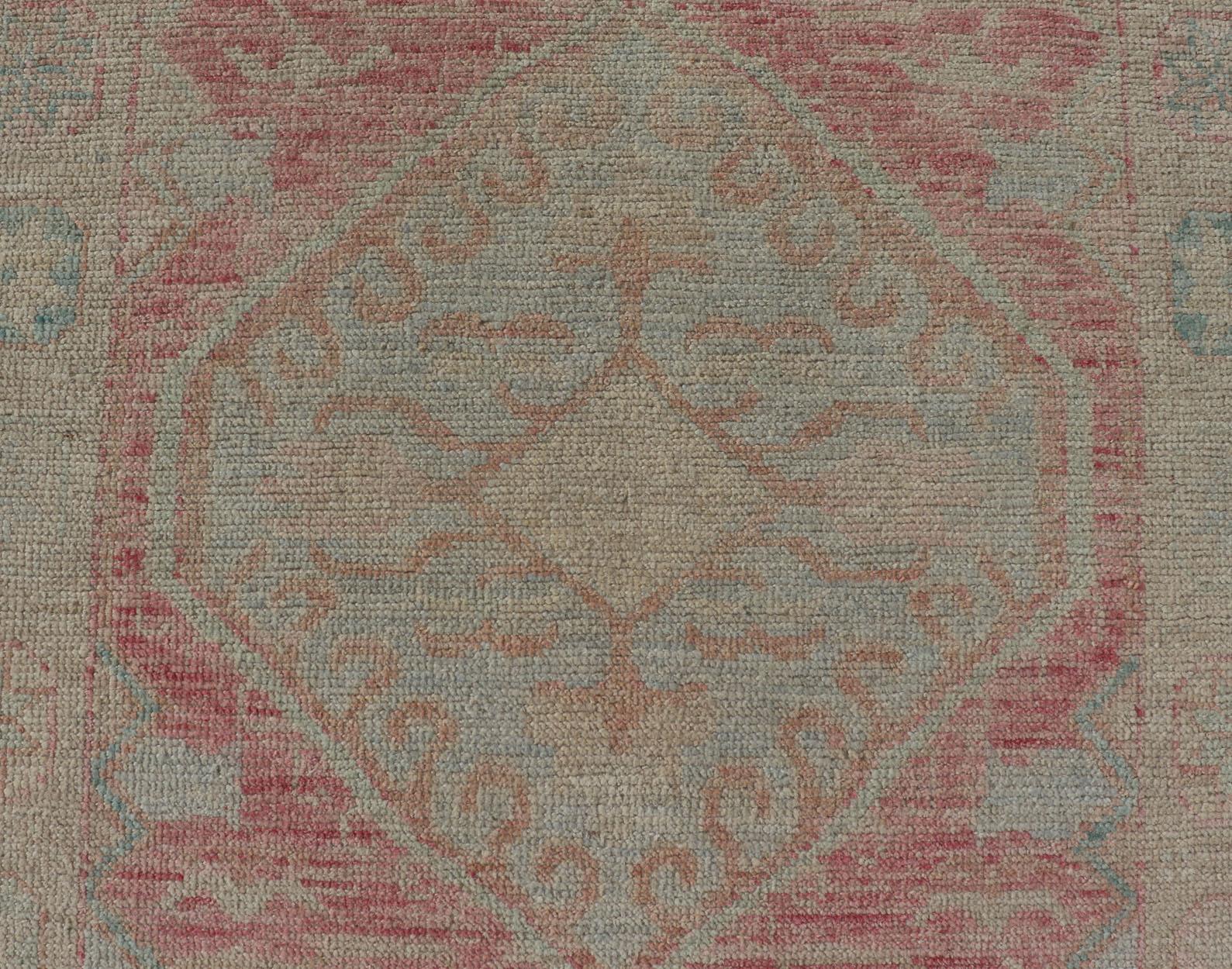 Afghan Modern Hand Knotted Oushak Runner With Medallions in Pink's and Creams For Sale