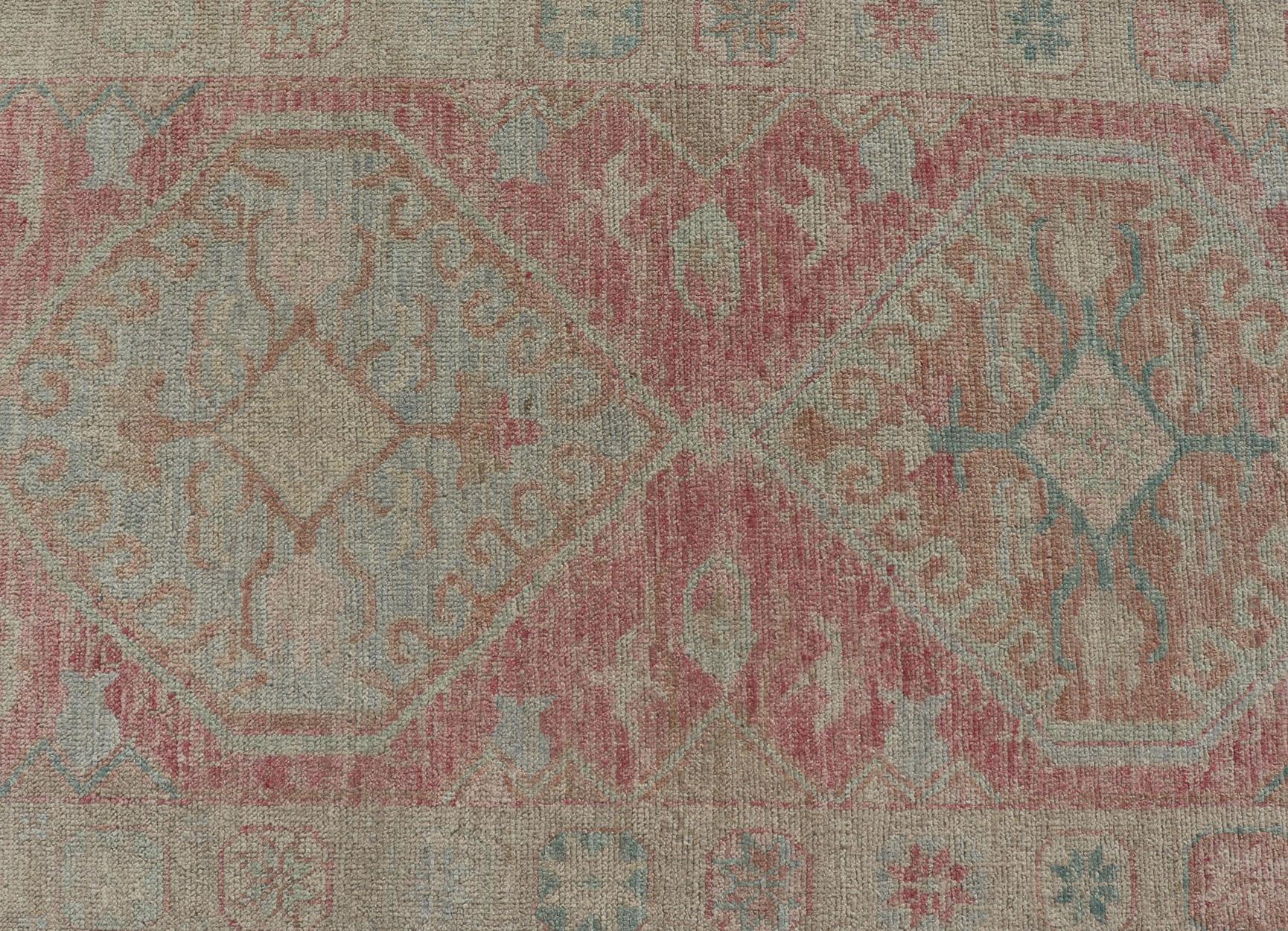Modern Hand Knotted Oushak Runner With Medallions in Pink's and Creams In New Condition For Sale In Atlanta, GA
