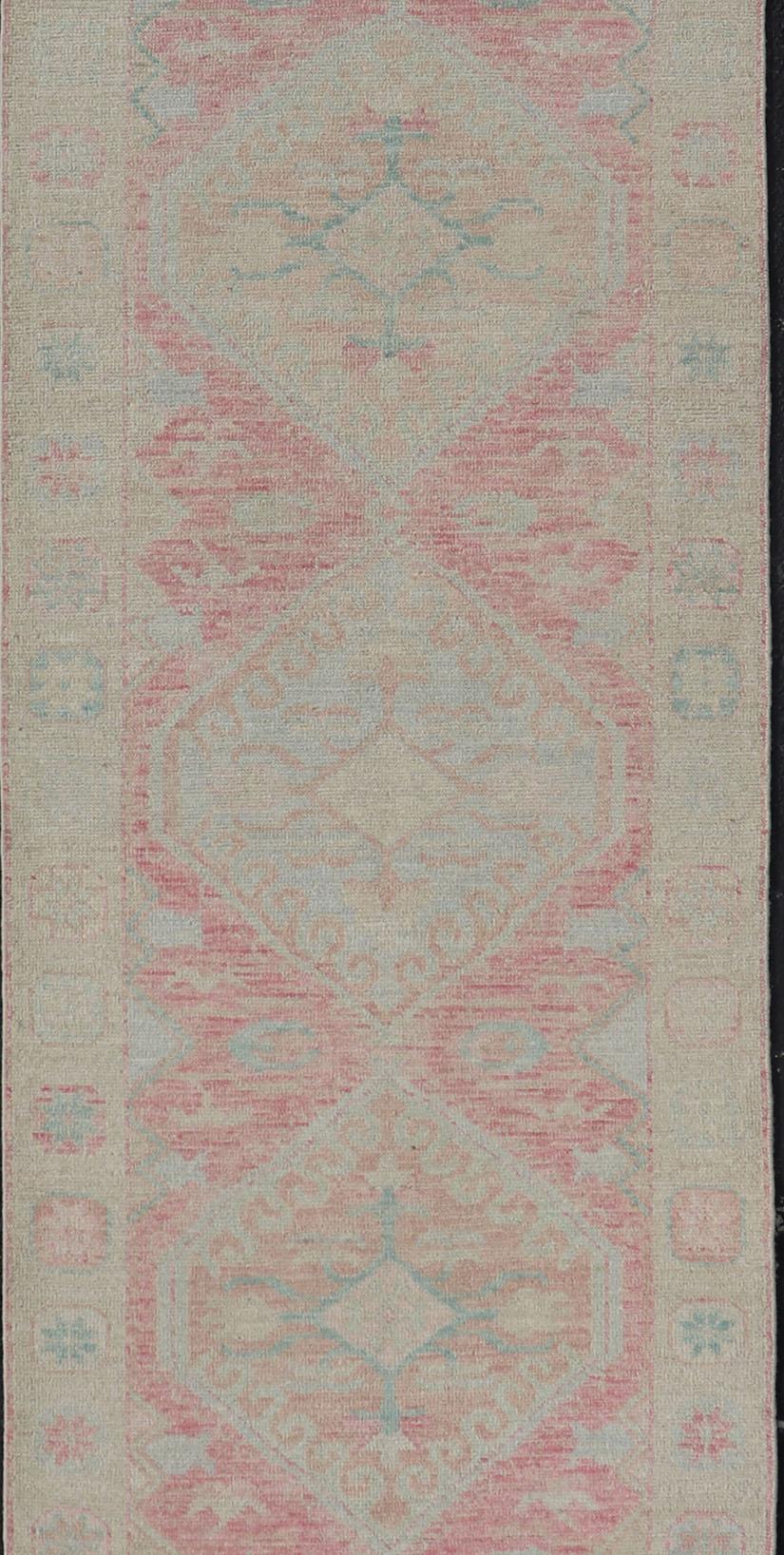 Modern Hand Knotted Oushak Runner With Medallions in Pink's and Creams For Sale 1
