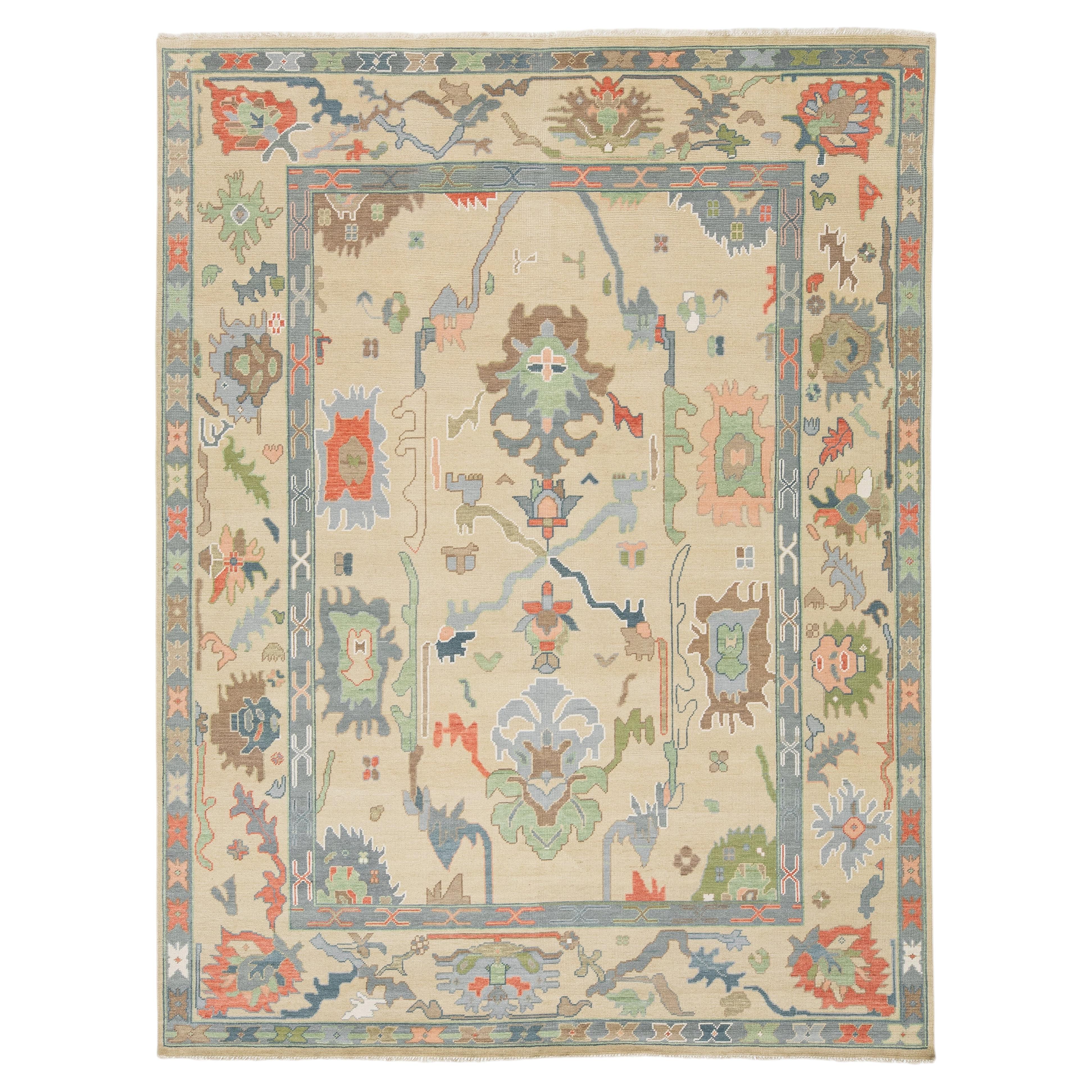Modern Hand-Knotted Oushak Style Wool Area Rug in Pastel Palette and Soft Beige