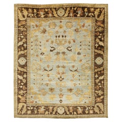 Modern Hand-Knotted Oushak Style Wool Area Rug in Soft Sky Blue and Ochre Gold