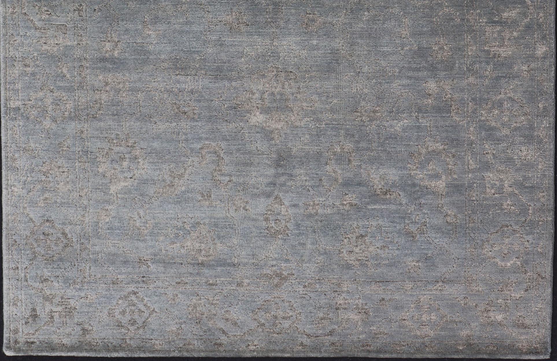 Alfombra moderna anudada a mano en lana con diseño floral en azul y gris 6' x 9' Siglo XXI y contemporáneo en venta